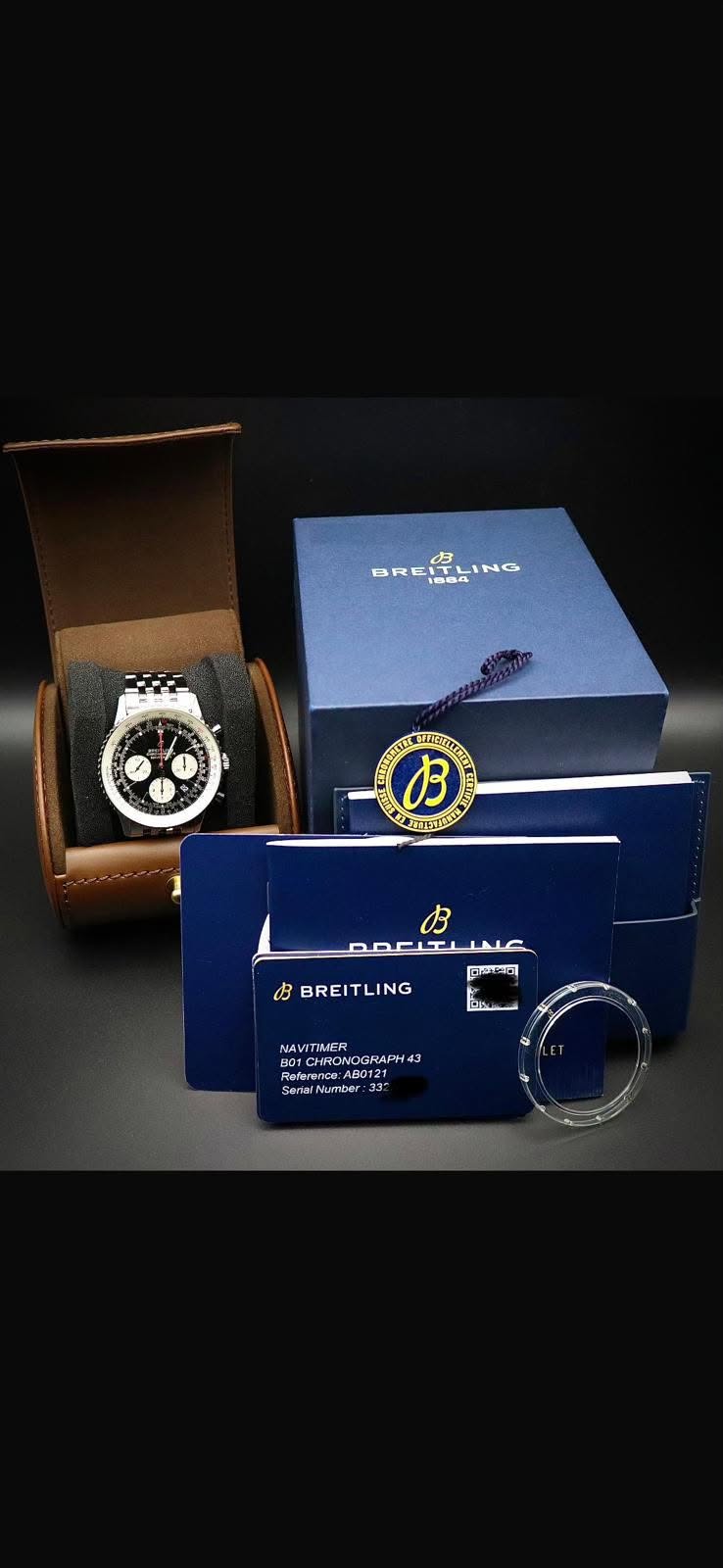 May be an image of cufflinks, digital watch and text