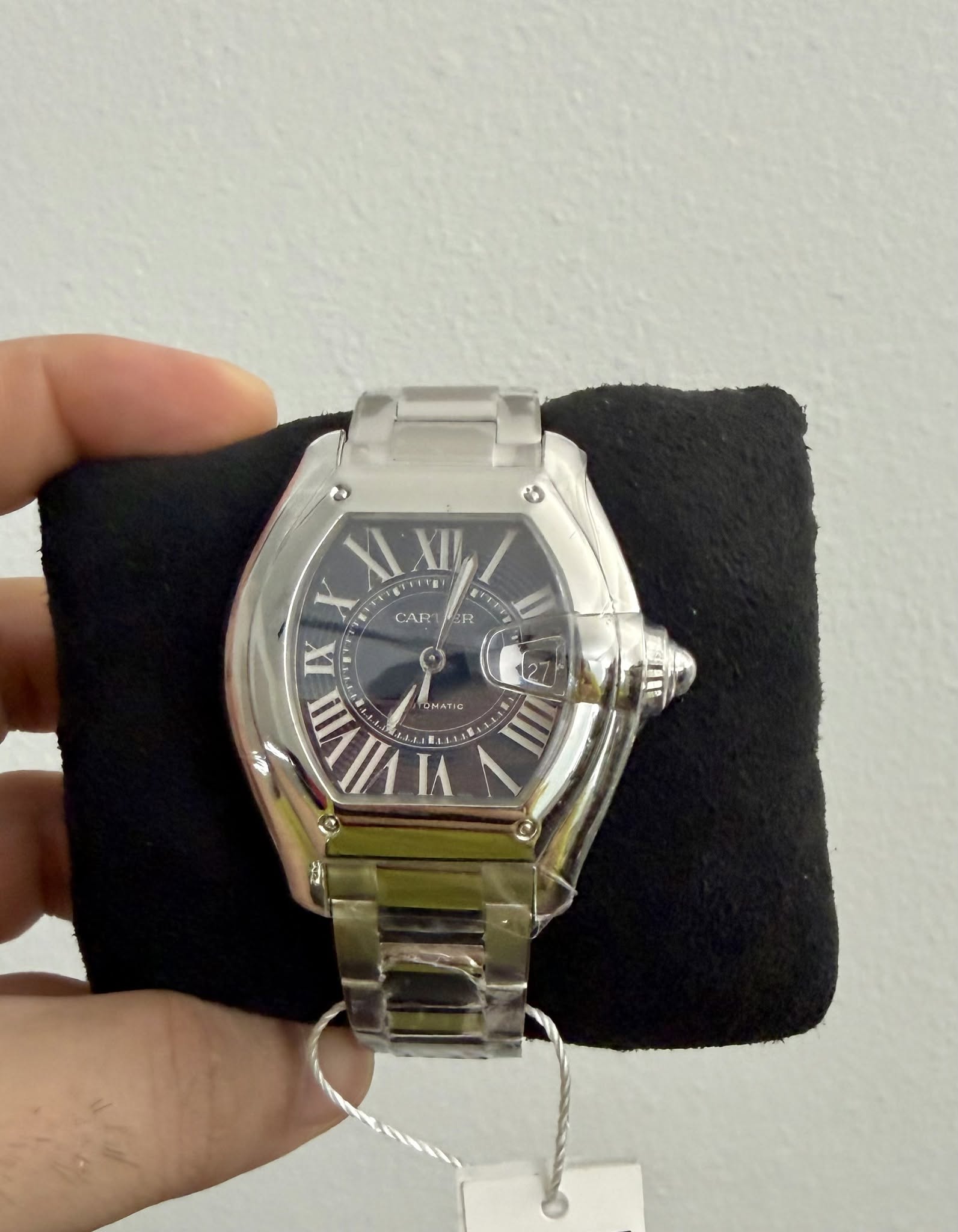 May be an image of digital watch and text