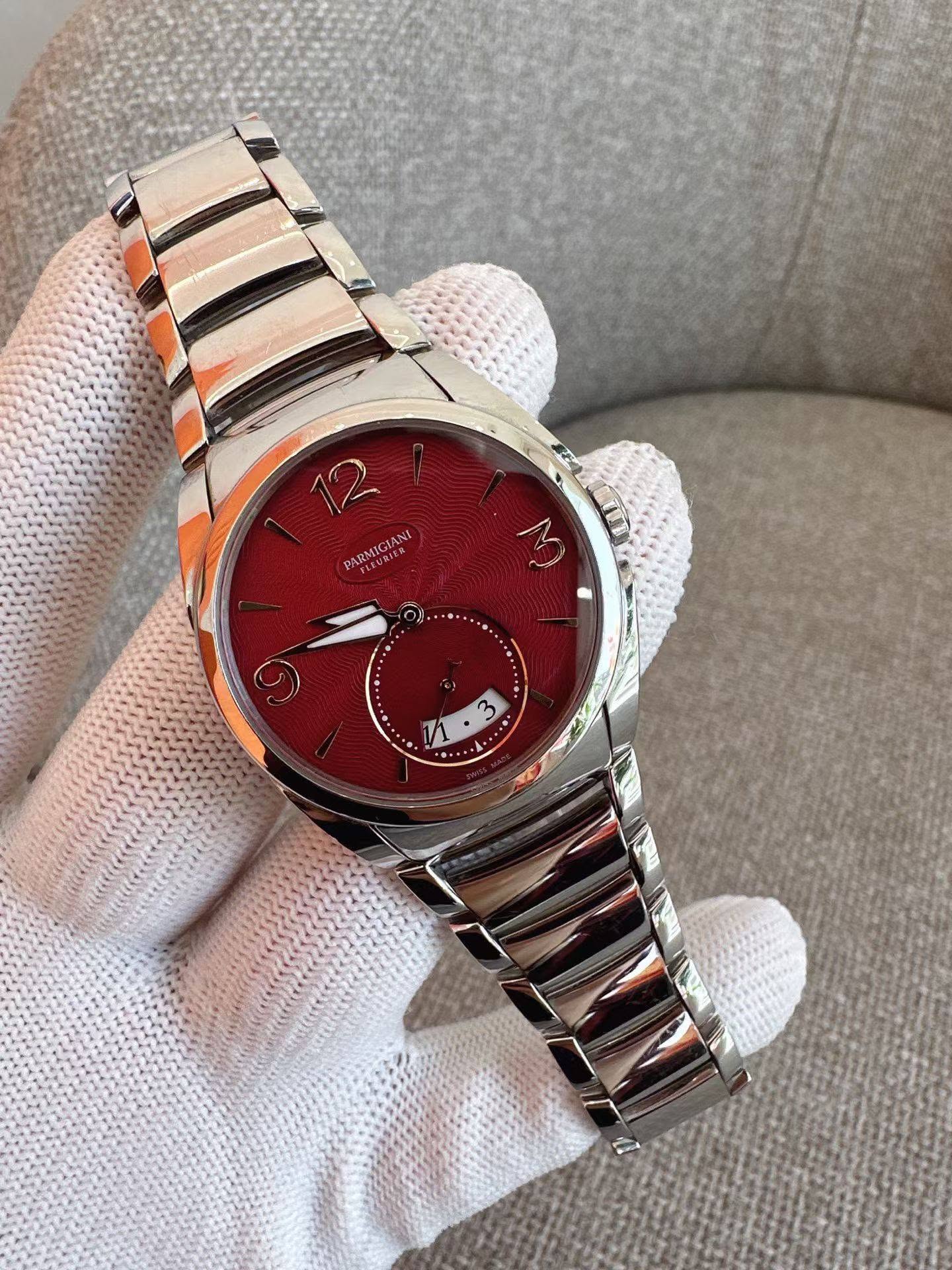 May be an image of wrist watch and text