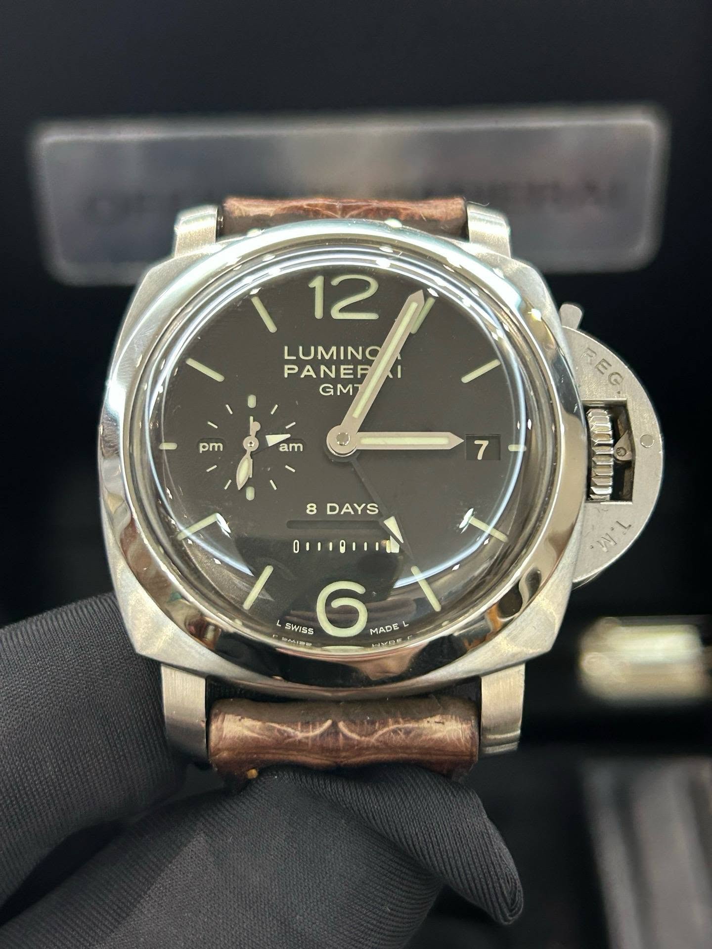 May be an image of wrist watch and text