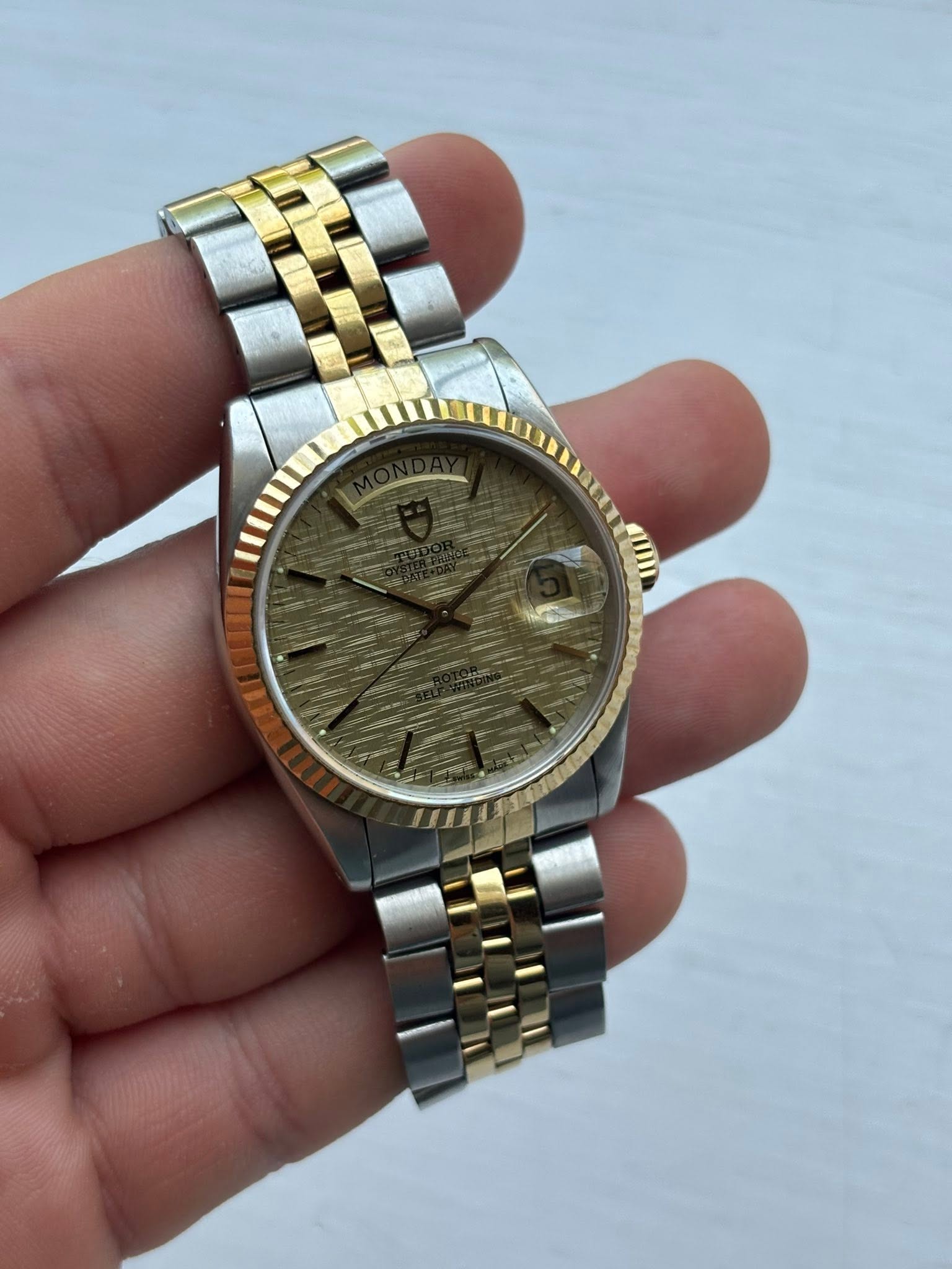 May be an image of wrist watch