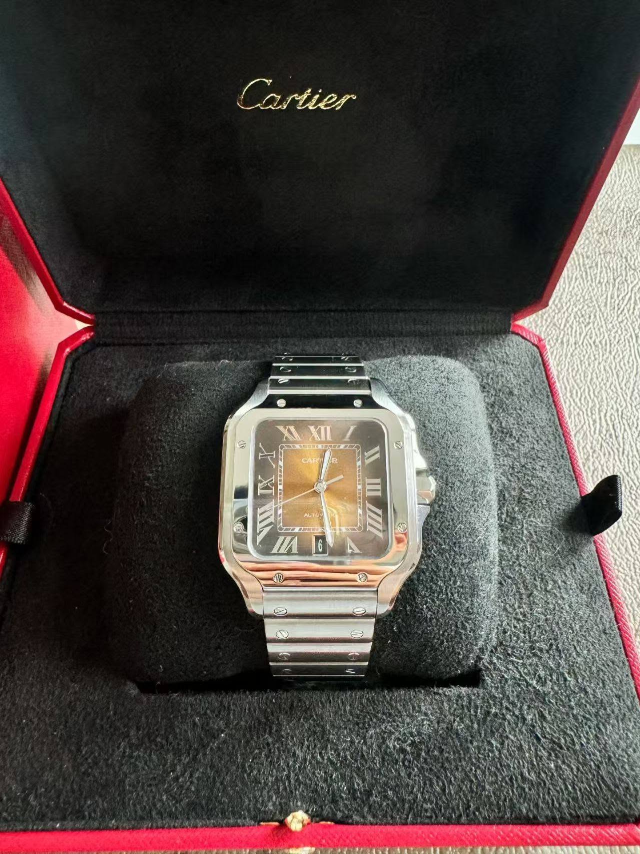 May be an image of wrist watch and text that says 'Cartier Ca tier XI 卵 CAR 2 IX الس IIII mI S L1'