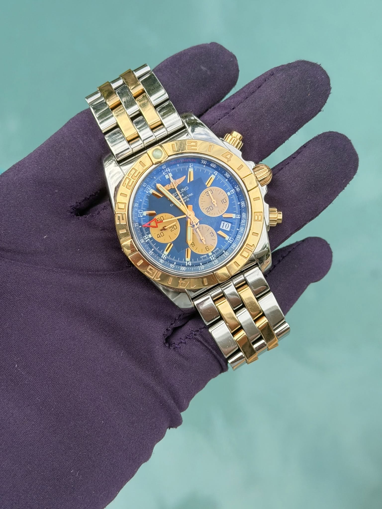 May be an image of wrist watch and text
