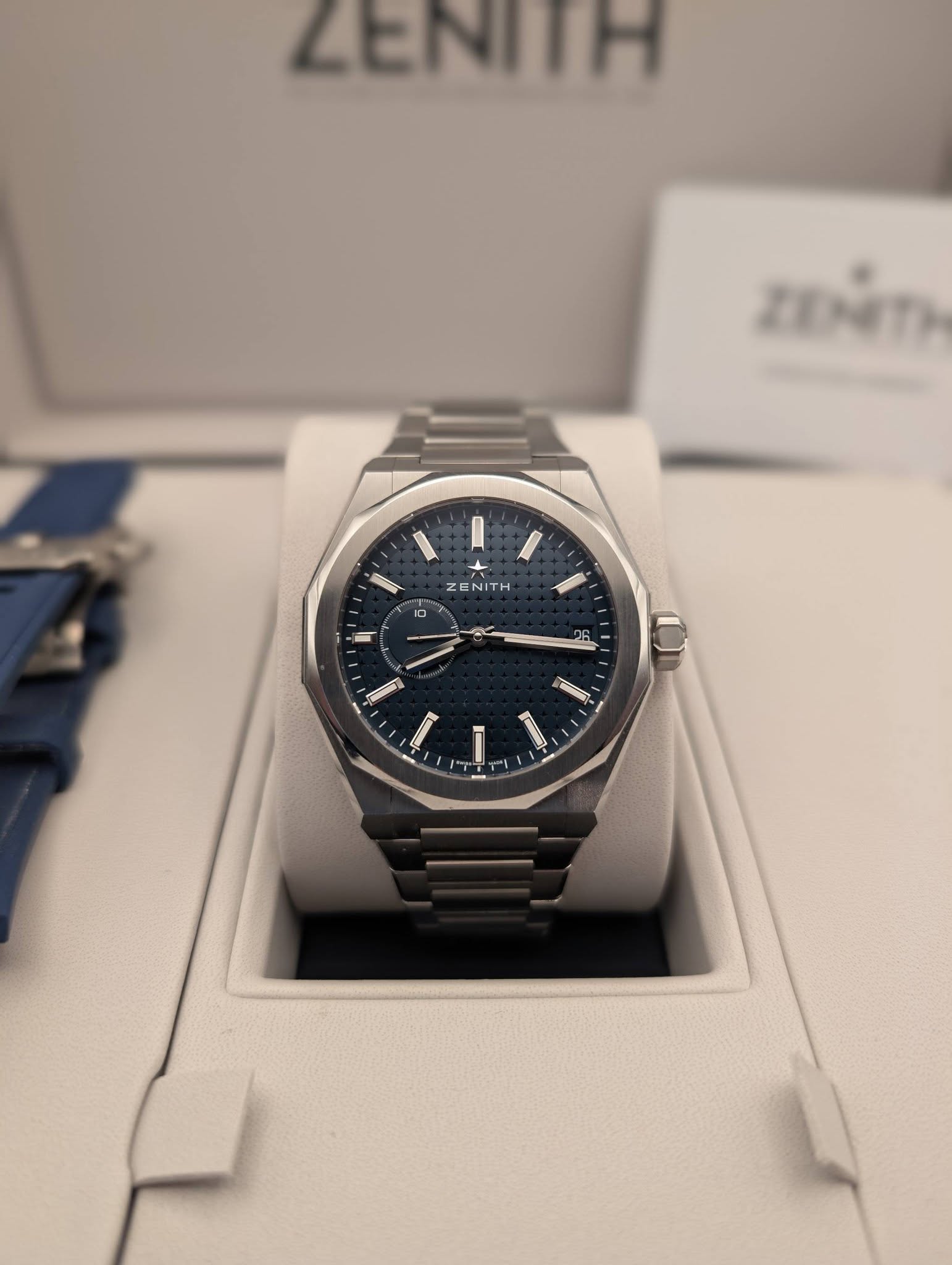 May be an image of wrist watch and text