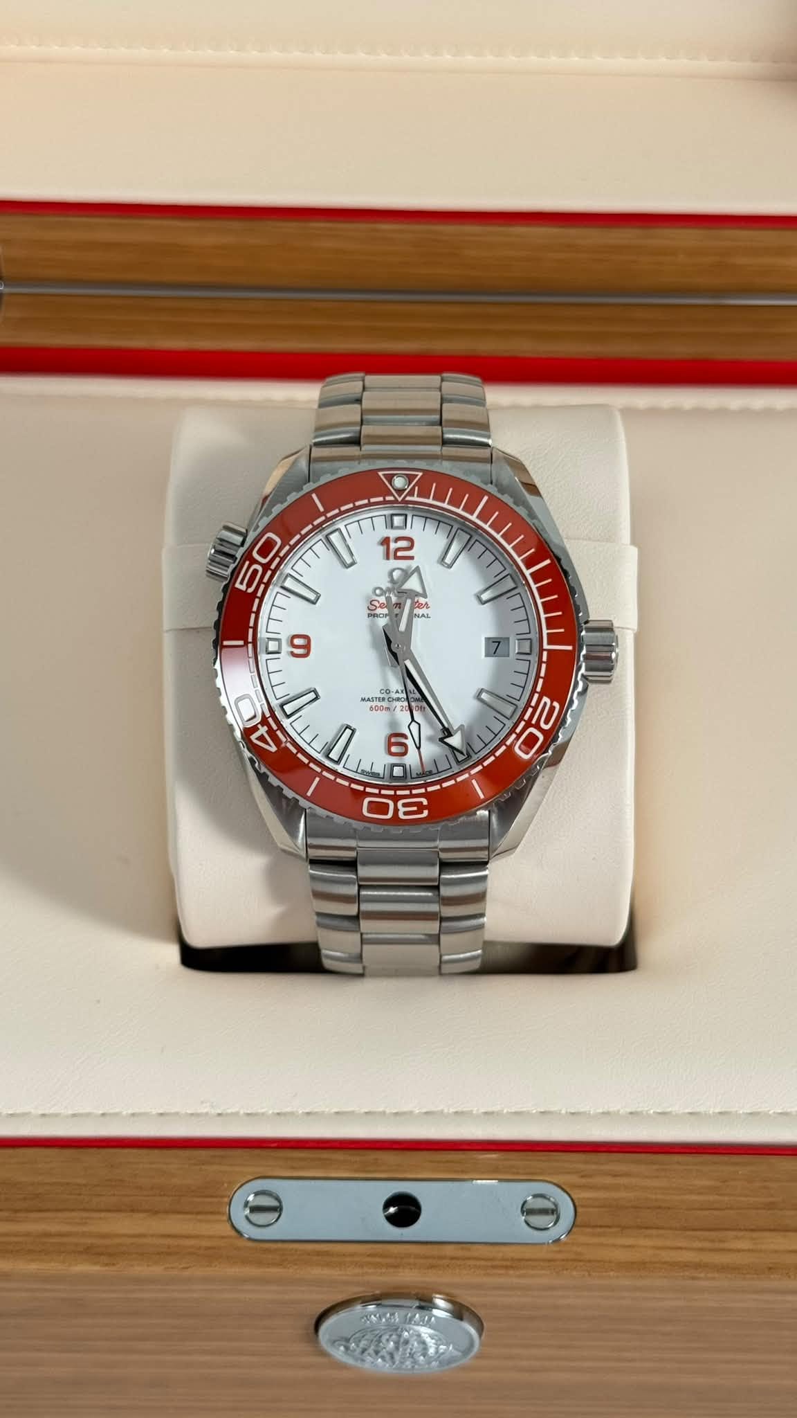 May be an image of wrist watch and text