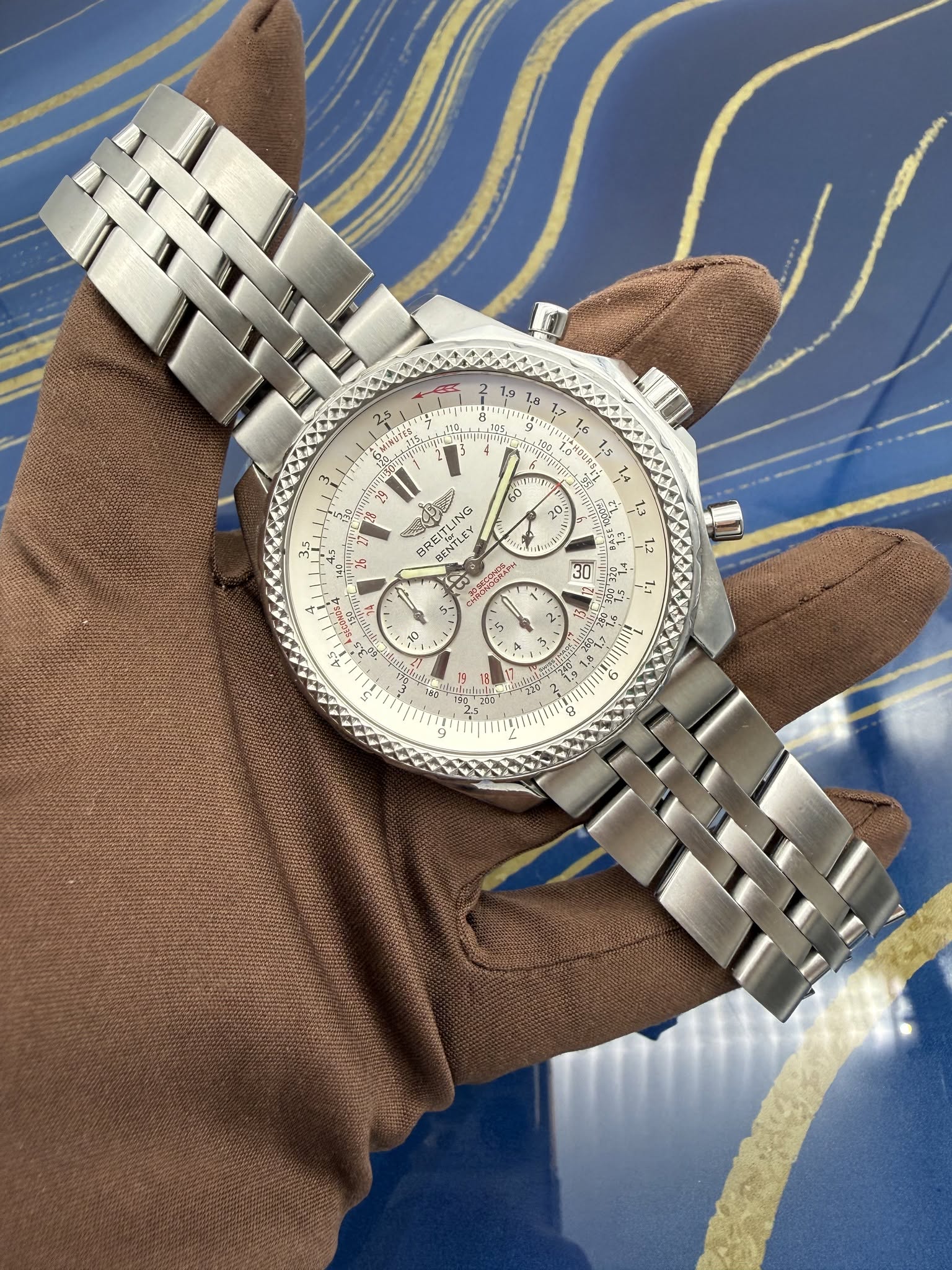 May be an image of wrist watch and text