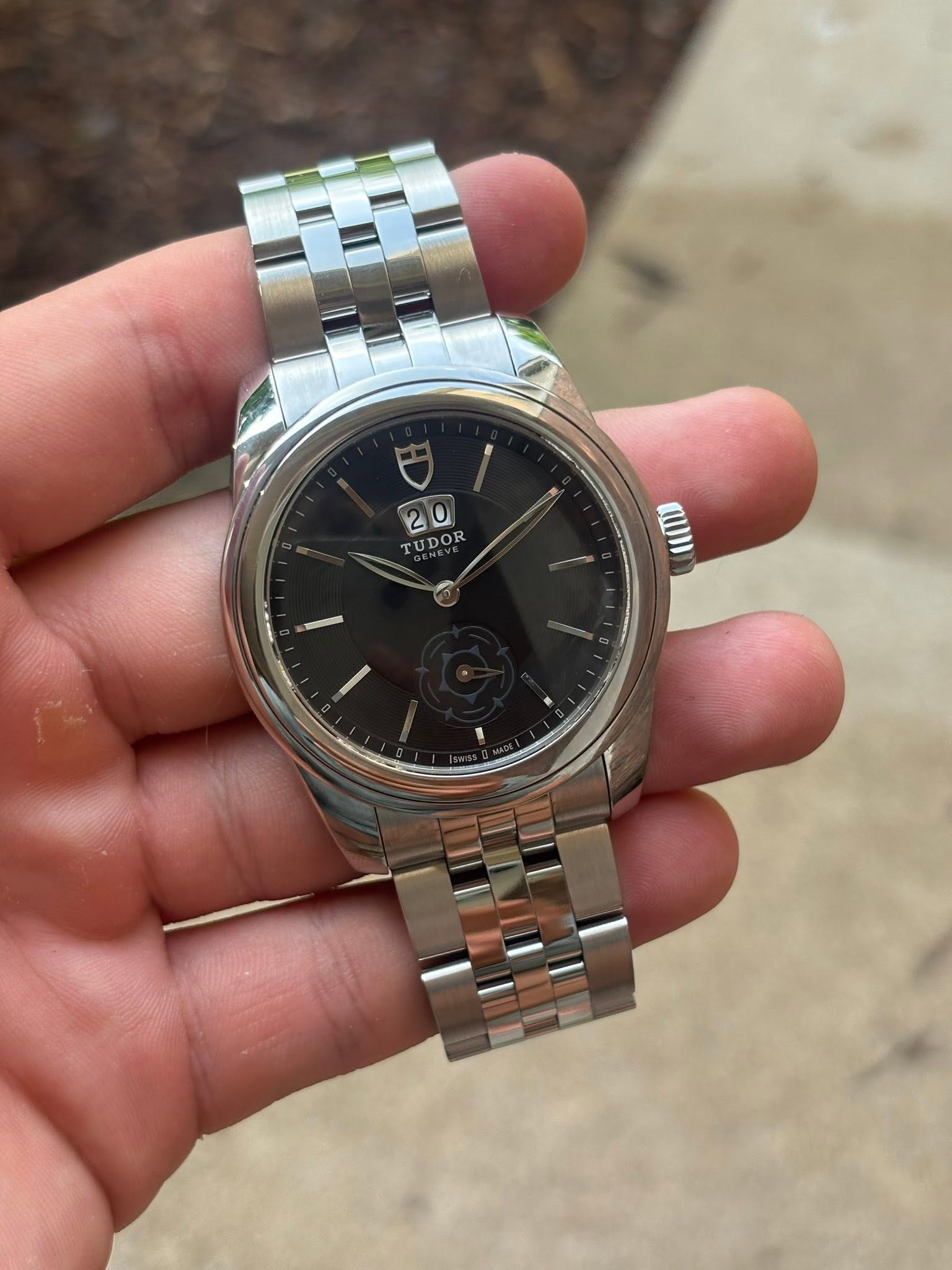 May be an image of wrist watch and text that says 'W 2'