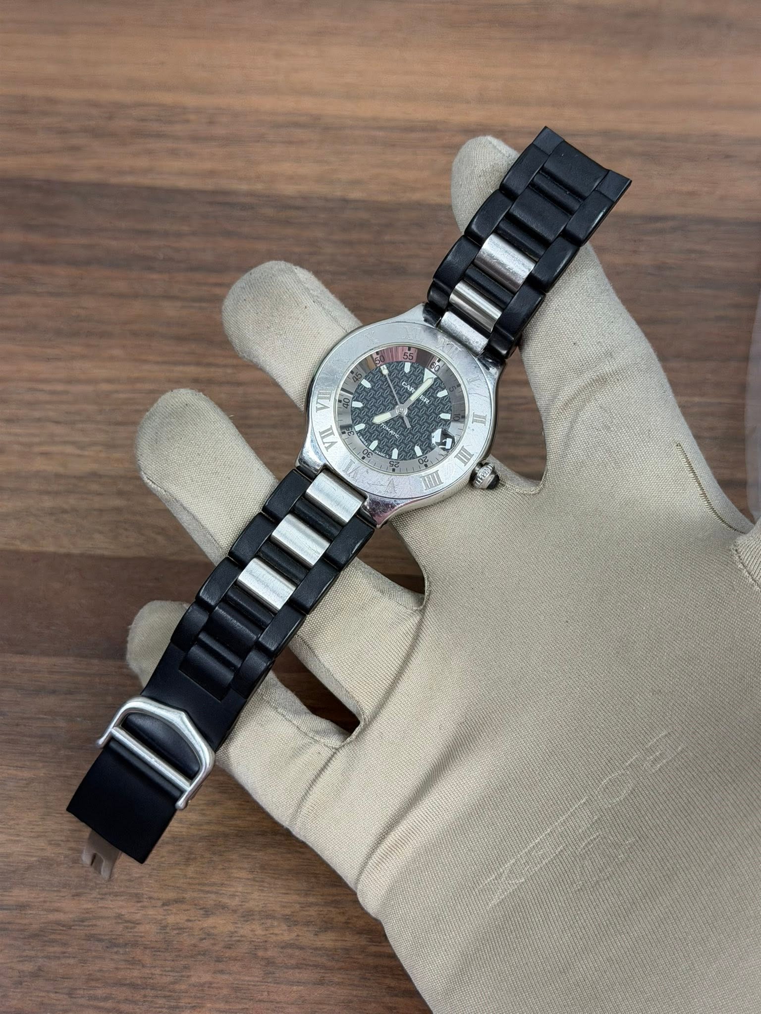 May be an image of wrist watch and text that says 't ta 20 HO 1 SAn 4 V P CA TI VII VII D III II H'