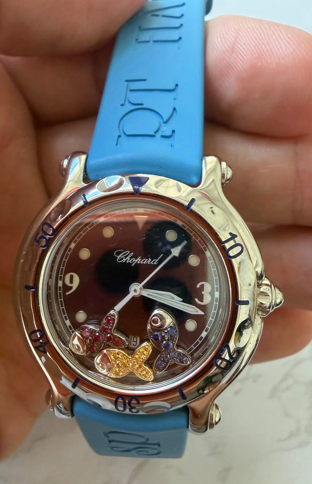 May be an image of wrist watch and text that says 'قمَ Chopard '