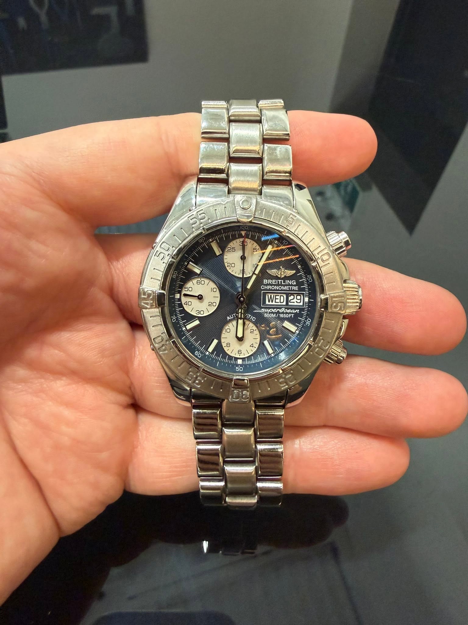 May be an image of wrist watch and text that says '55 50 Po ဆ 20 20 30 a 흑사 BREITLING CHRONOMETRI WED 29 BOCM/ BOCM ФoHaл อล Tie A افل T- O A A - - 8 9 ม B 2 6 6 fn LI 60 3. شا…