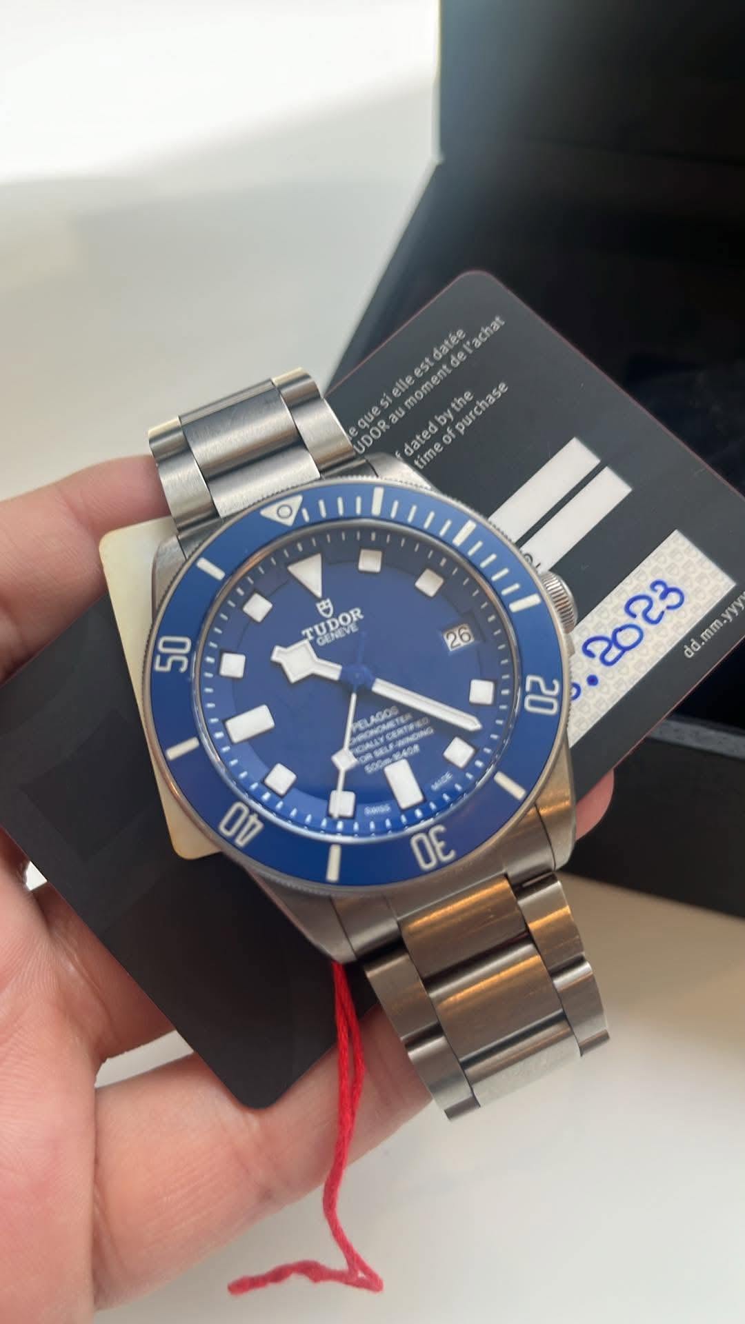 May be an image of wrist watch and text that says 'chat est 1O datée 00 el elle nom UDOR ue dated of purcnase ieca time time O UDOR OR 巴 oлHииe 50 26 nulin 2023 dd. dd.mm.yyy yyy…