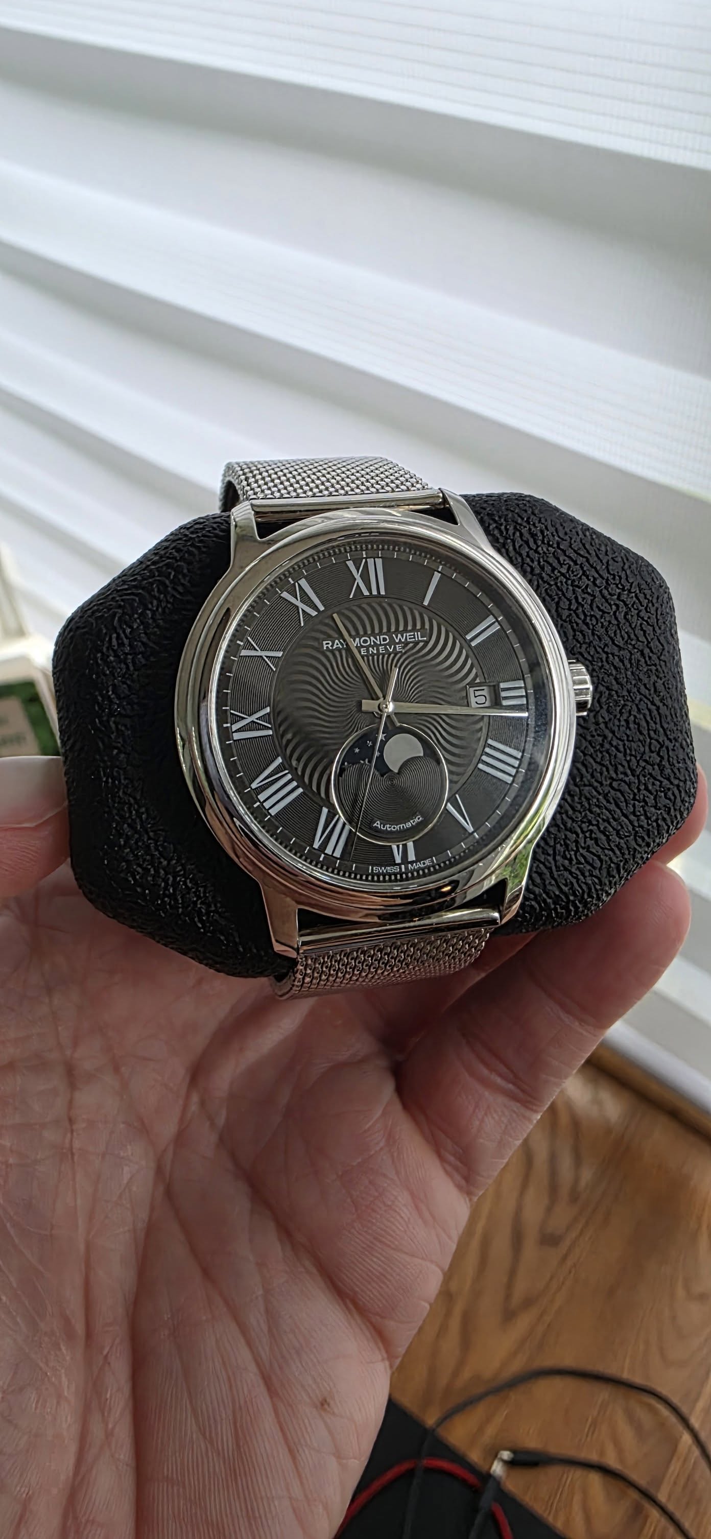 May be an image of digital watch and text