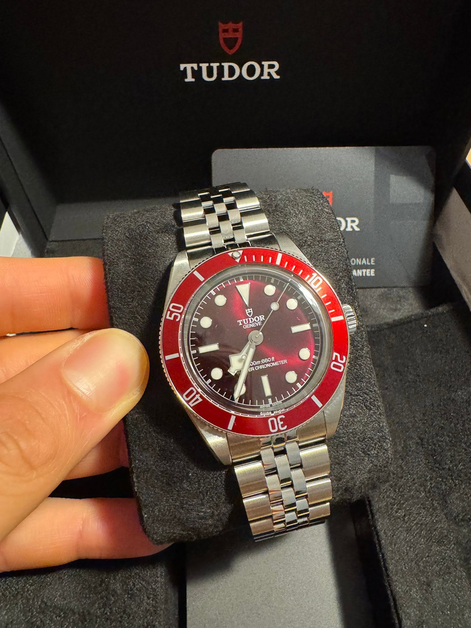 May be an image of wrist watch and text