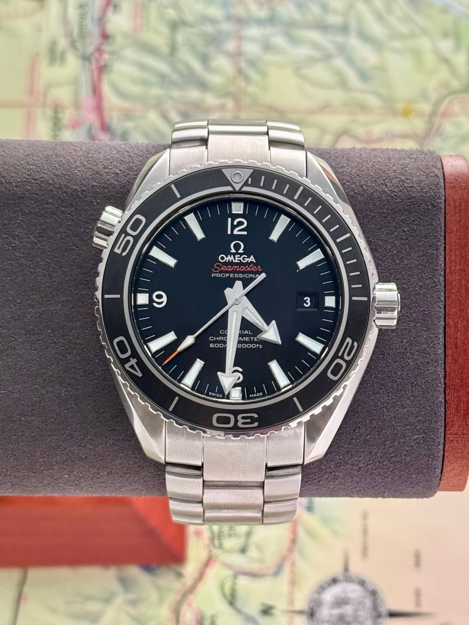 May be an image of wrist watch and text that says '口 12 50 5C I' OMEGA PROFES PROFESSIONA PROFESSIONA 55 IC PROP / 9 3 CH円O 600 2000 OOOrs ots 40 ូ០៉ូ 20 MADE 30'