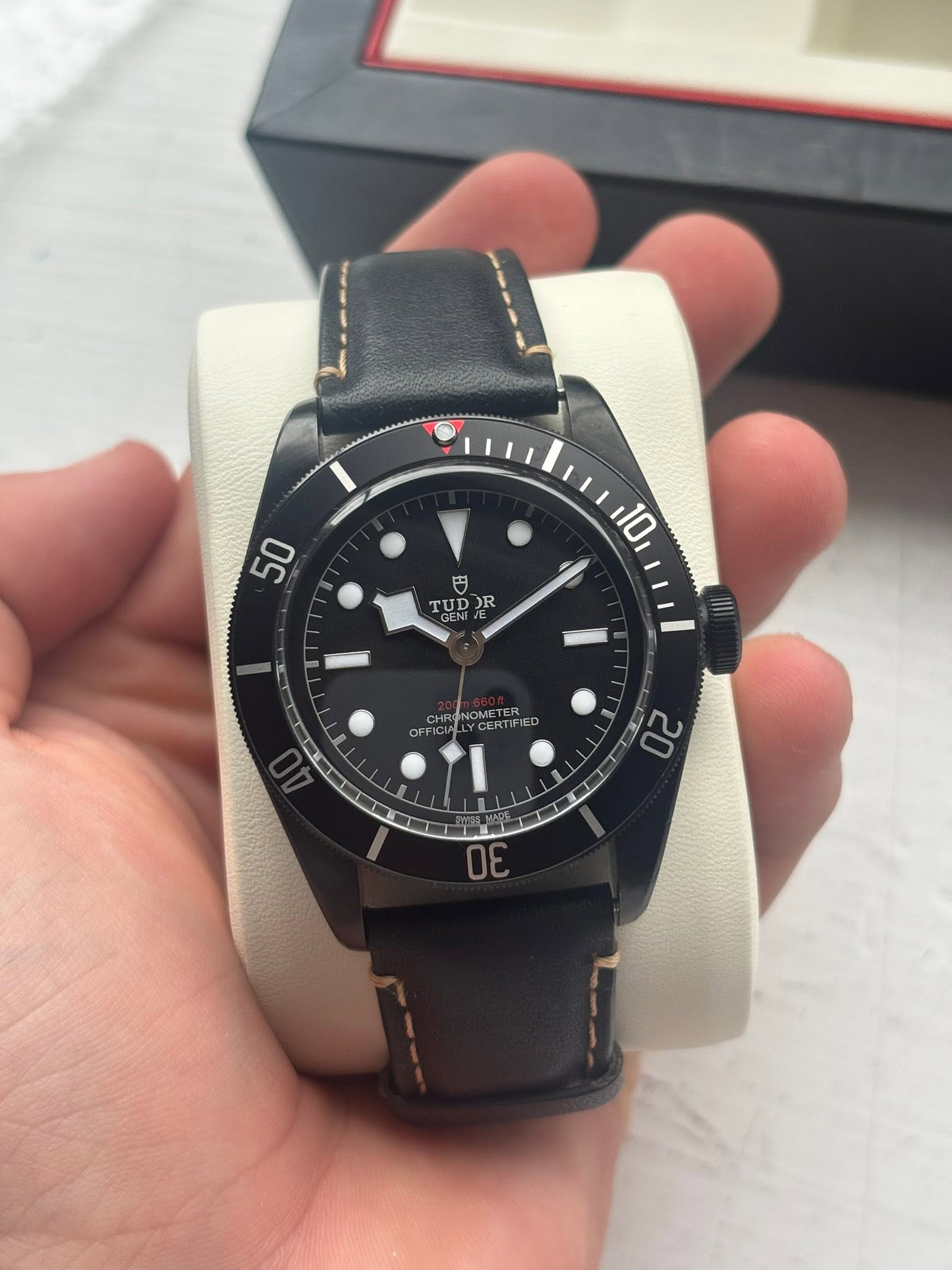 May be an image of wrist watch and text that says '50 50 10 円 TUDOR TUP R D CHR CERTIFIE G OFFICI I 無· 20 3'