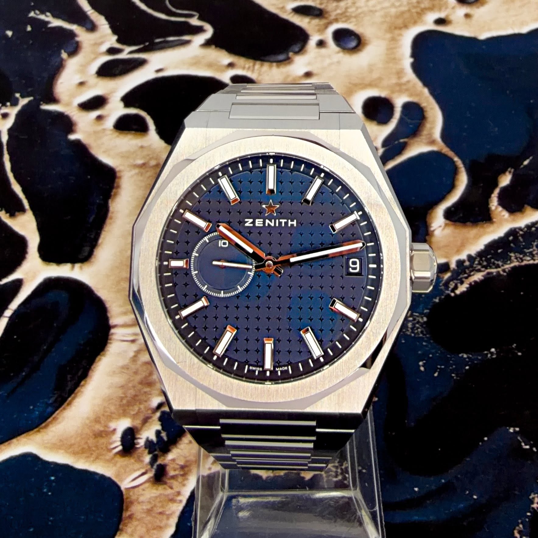 May be an image of wrist watch and text