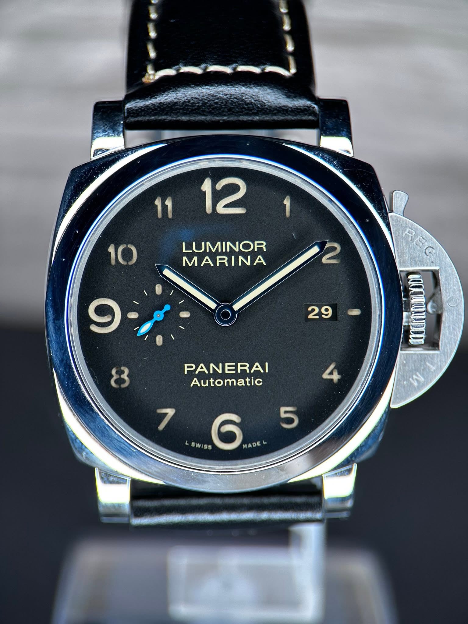 May be an image of wrist watch and text that says ' LUMINOR MARINA 2 9 29 8 PANERAI Automatic 4 7 5 5 SWISS 6 MADE'
