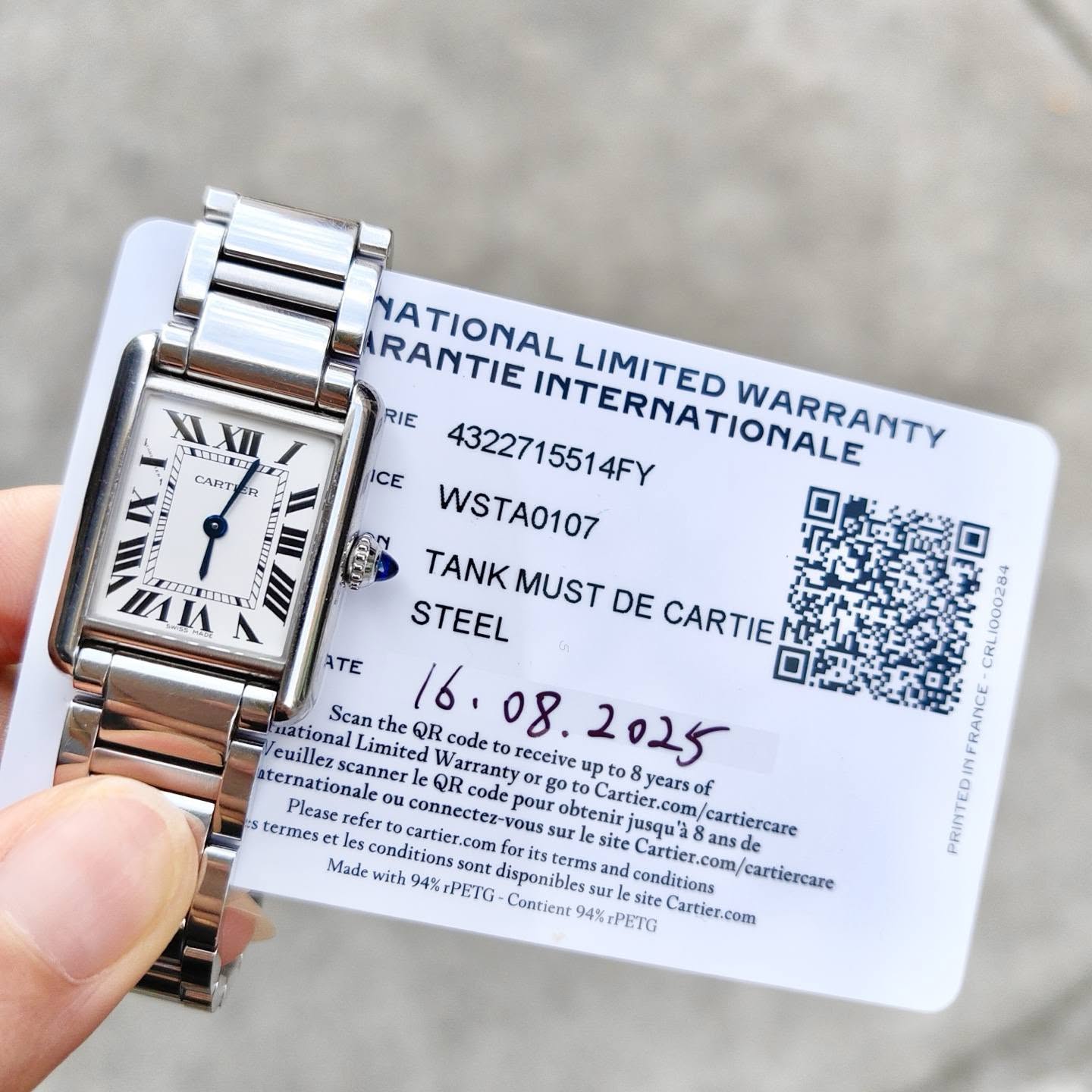 May be an image of wrist watch and text that says 'XIXII PRITTIRT CART IX 6Hr E nЛИ Иrr N ATE RANTIE NATIONAL LIMITED RIE 4322715514FY INTERNATIONALE 5514FY WARRANTY ICE WSTA0107…