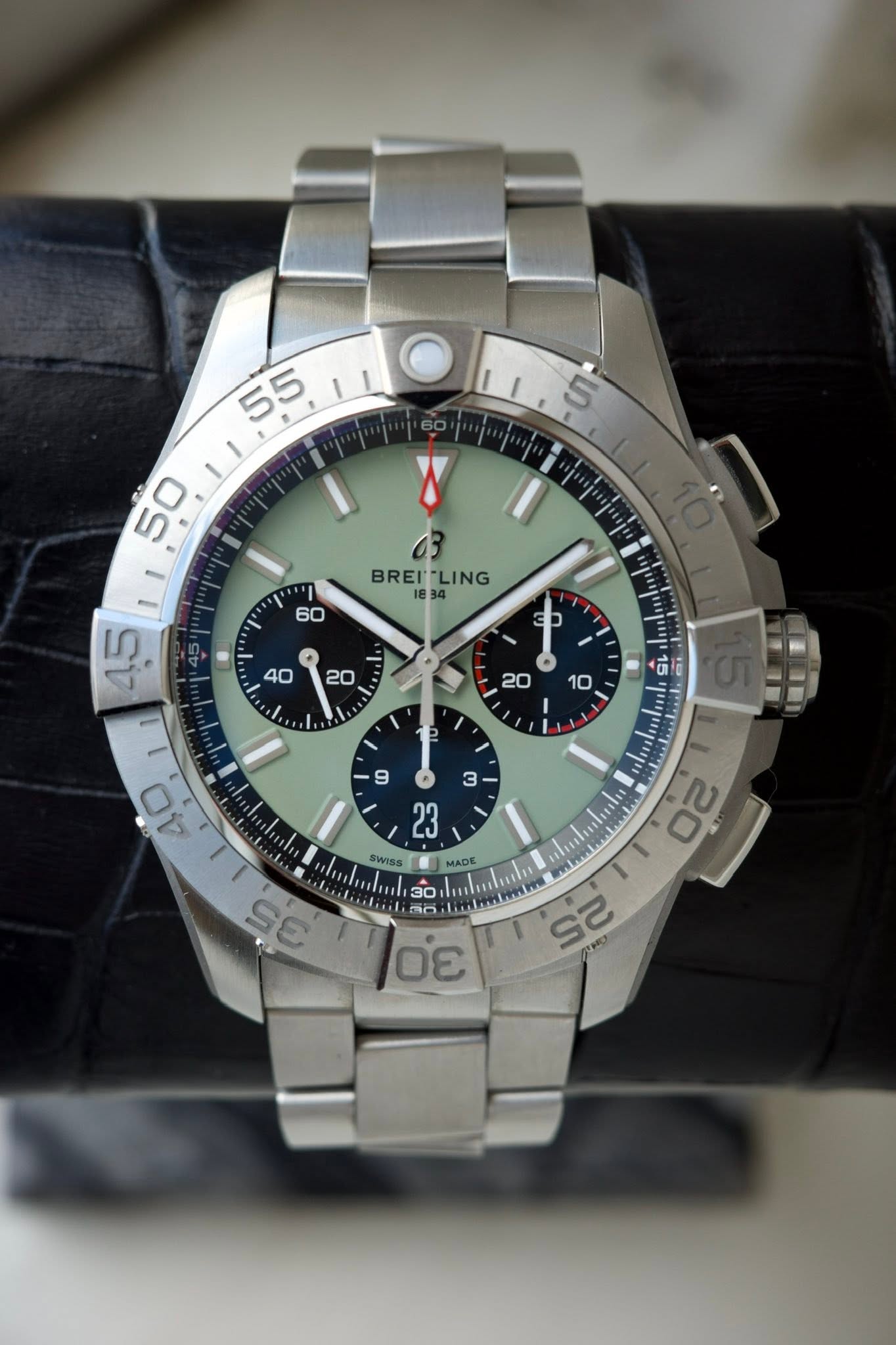 May be an image of wrist watch and text