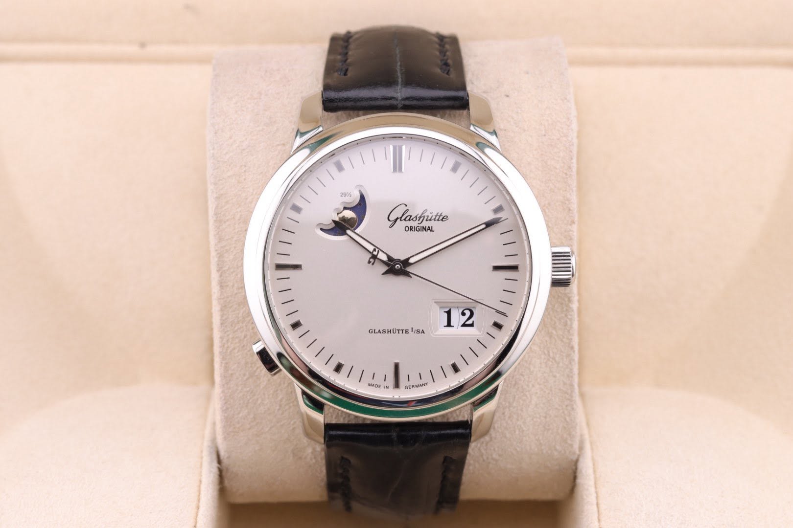 May be an image of wrist watch and text