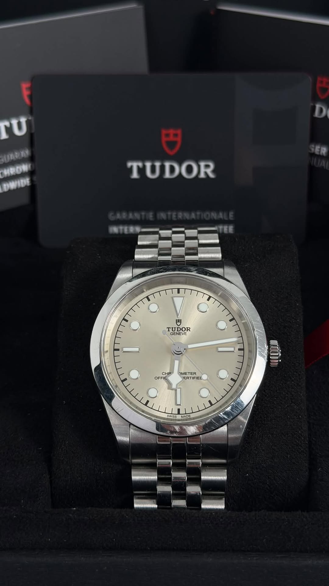 May be an image of wrist watch and text