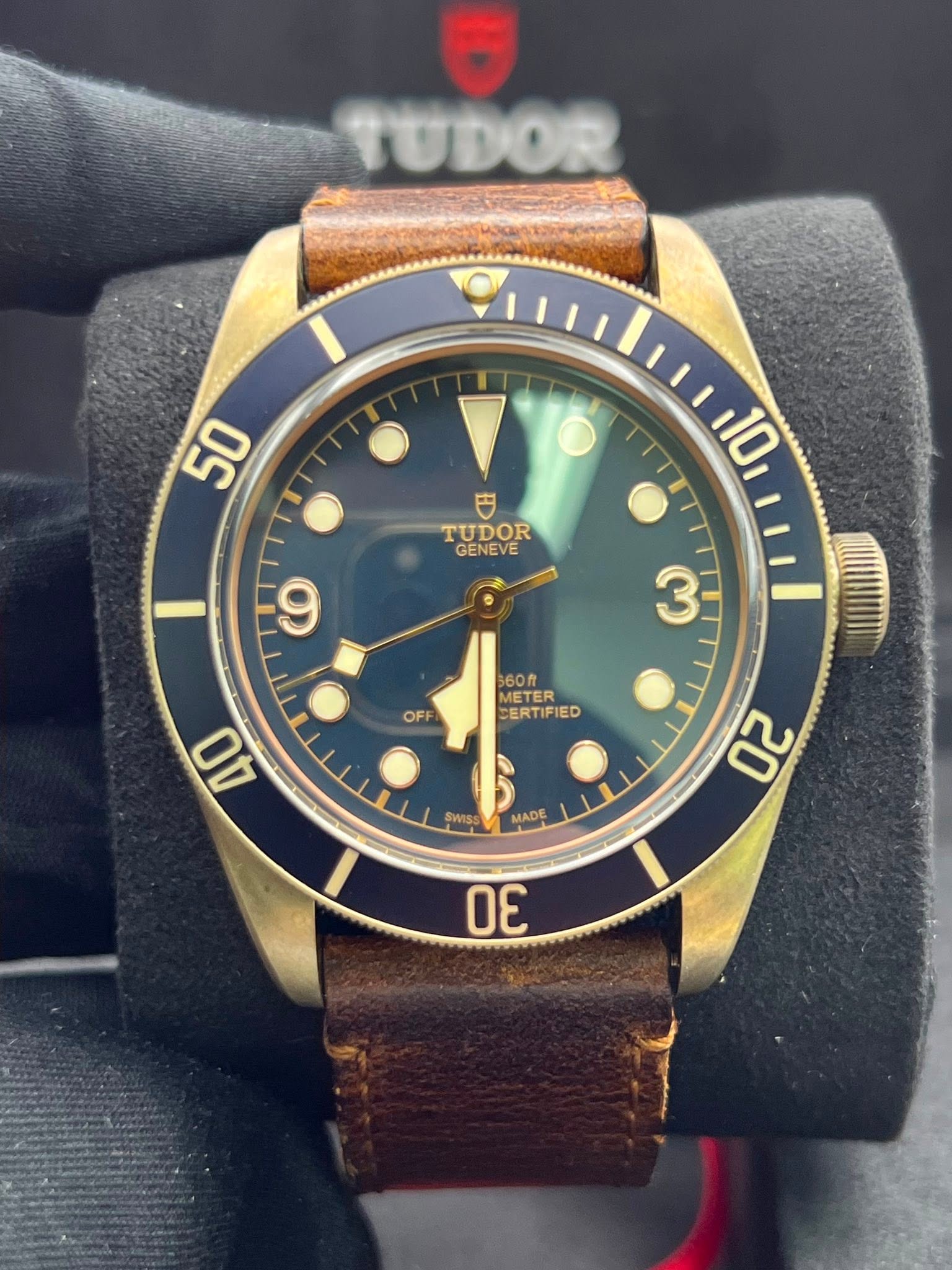 May be an image of wrist watch and text that says '50 10 TUDOR GENEVE 9 3 OFF 360f METER S CERTIFIED 40 SWISS MADE 20 30'