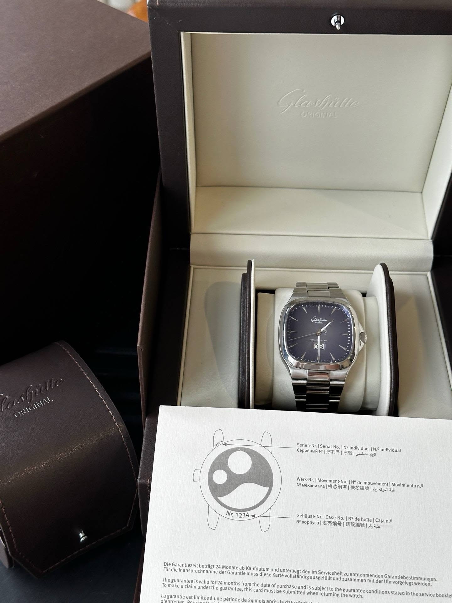 May be an image of digital watch and text
