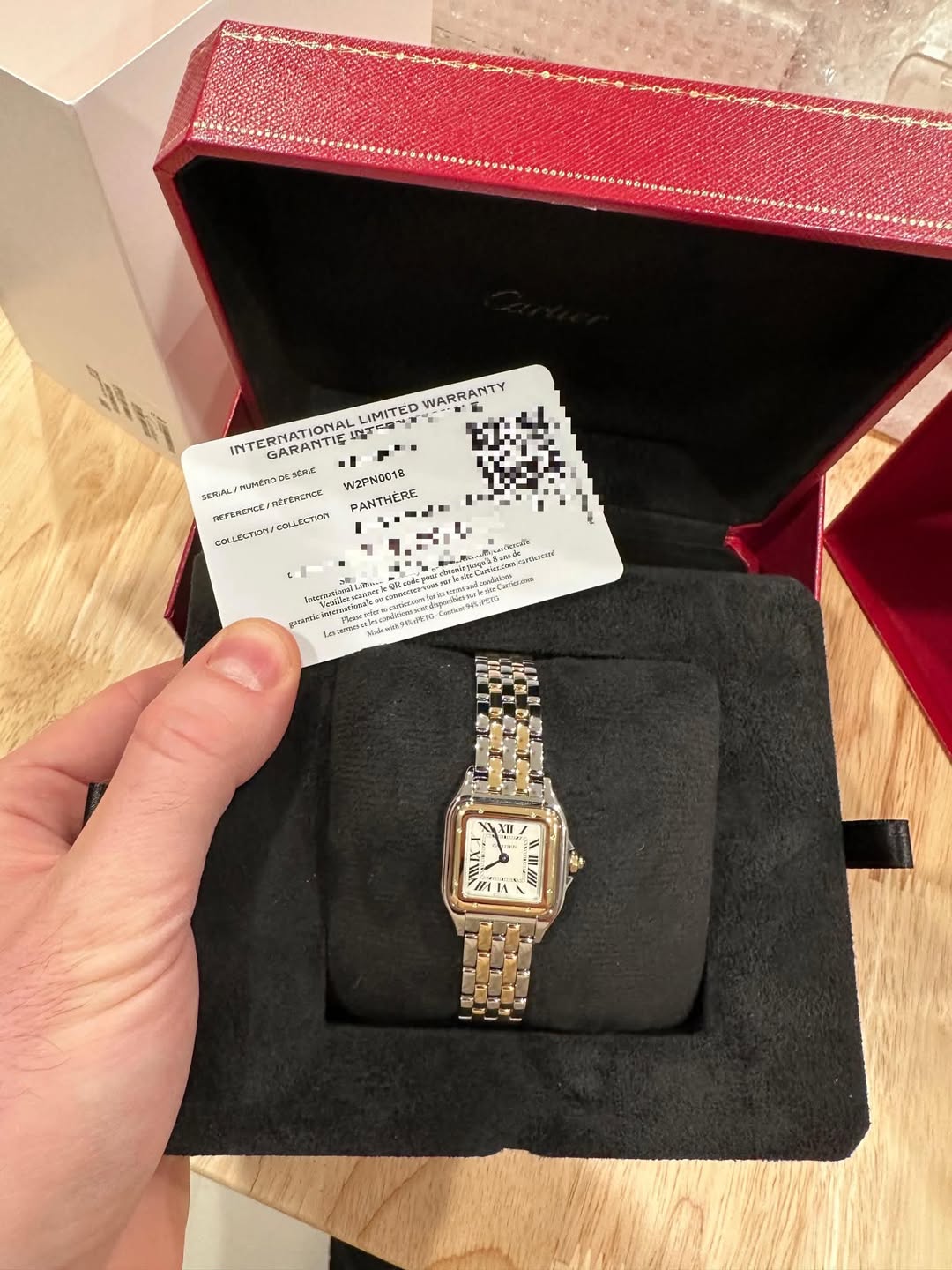 May be an image of wrist watch and text