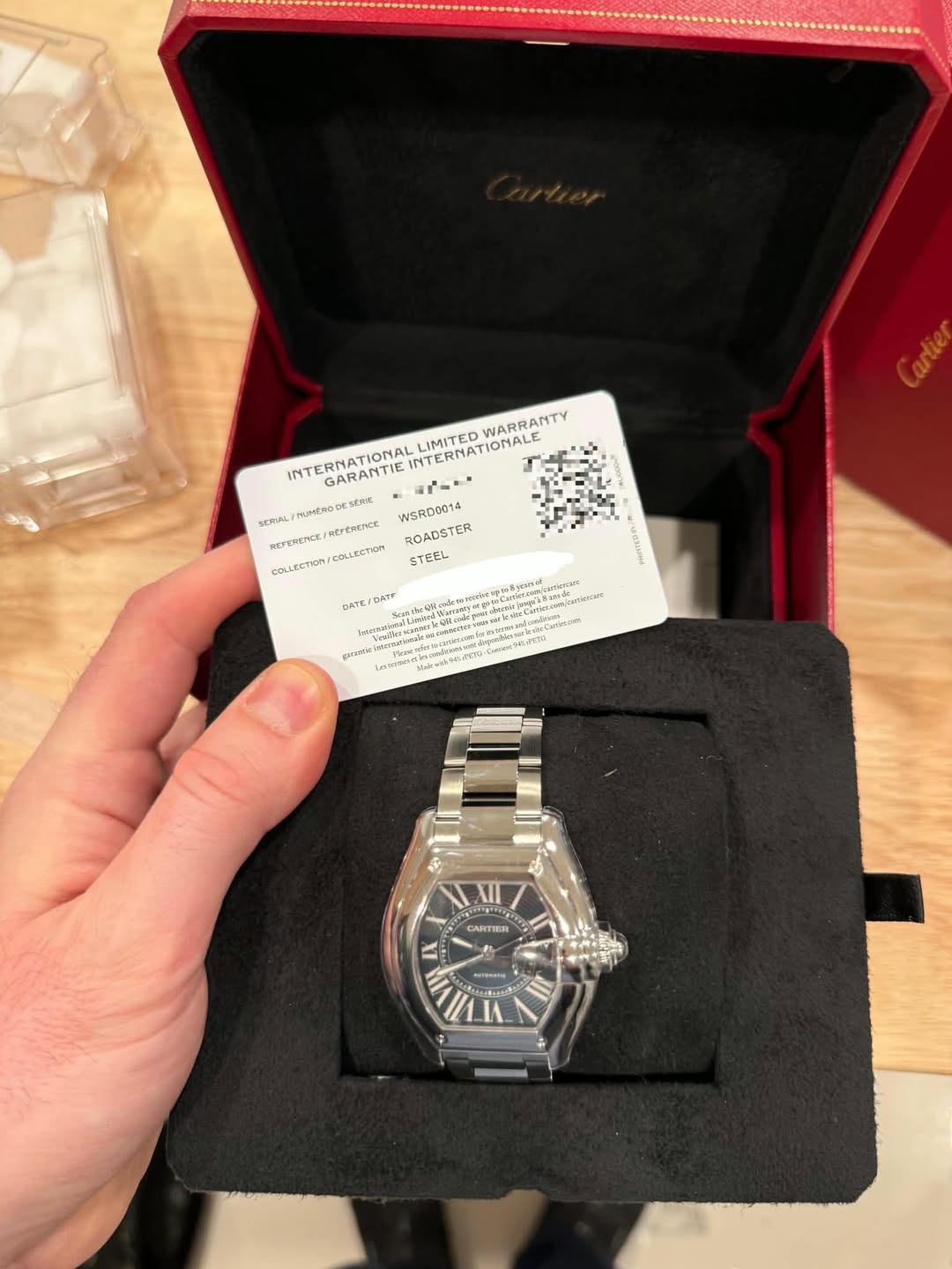 May be an image of wrist watch and text