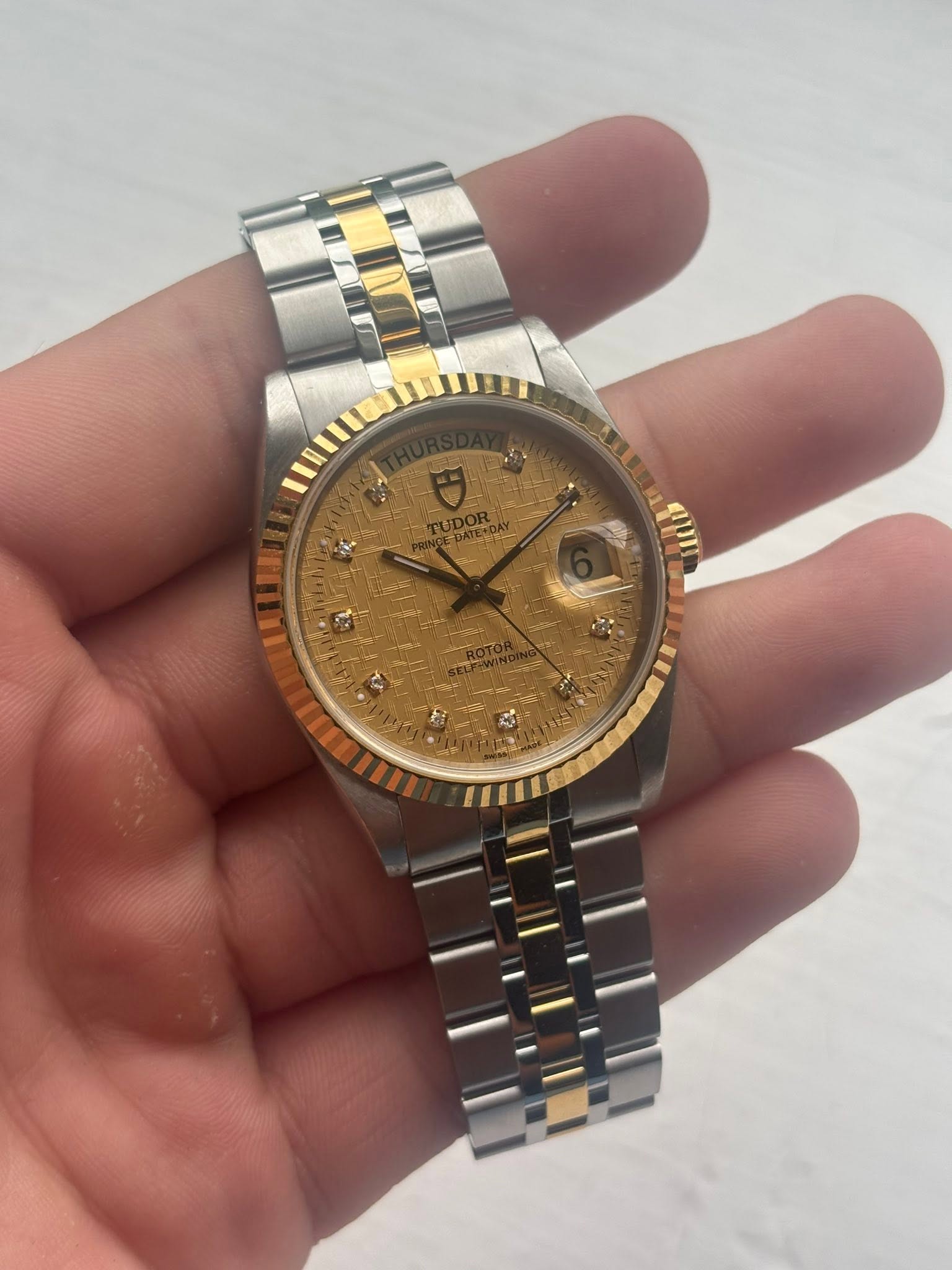 May be an image of wrist watch