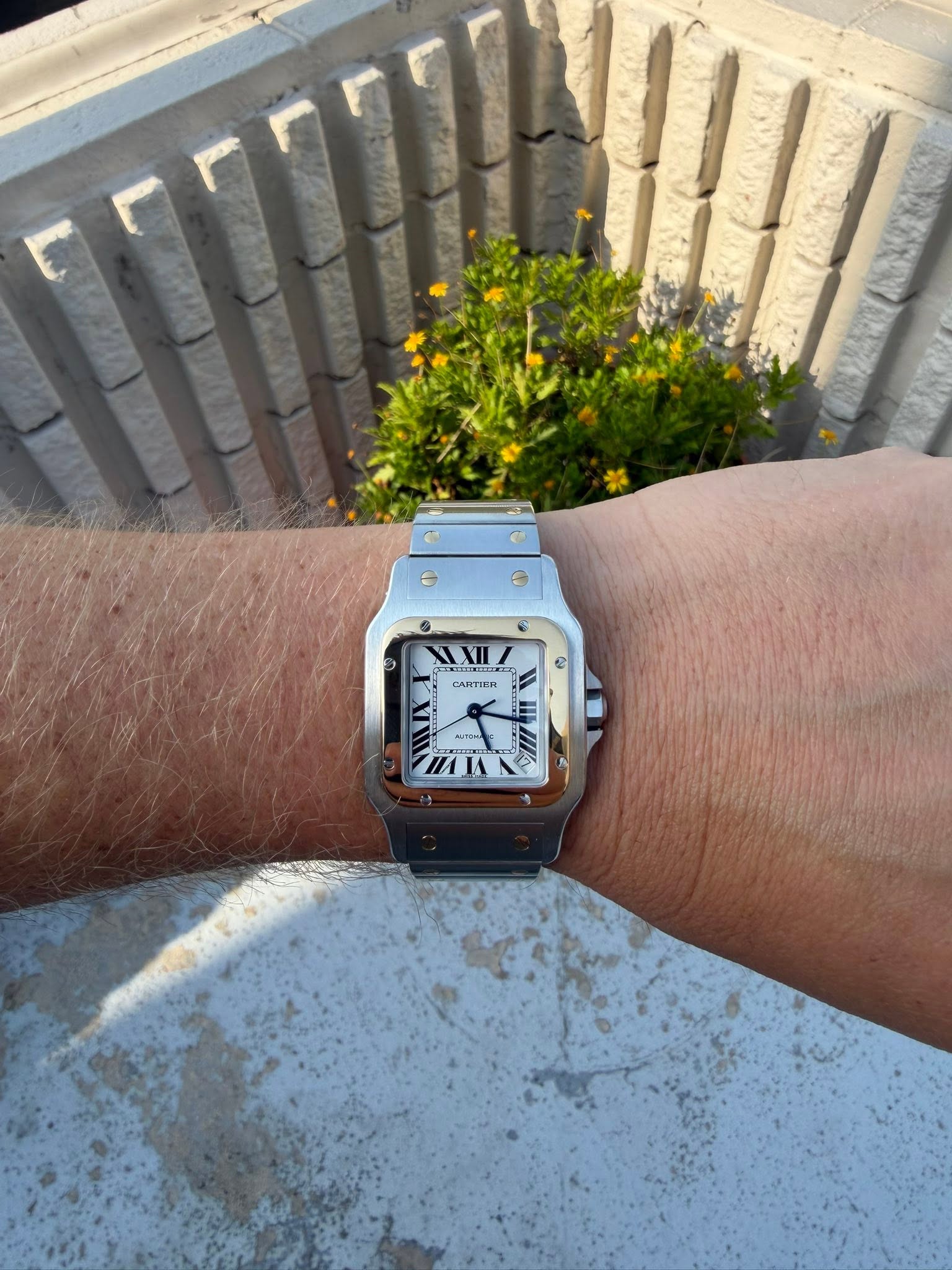 May be an image of digital watch and text