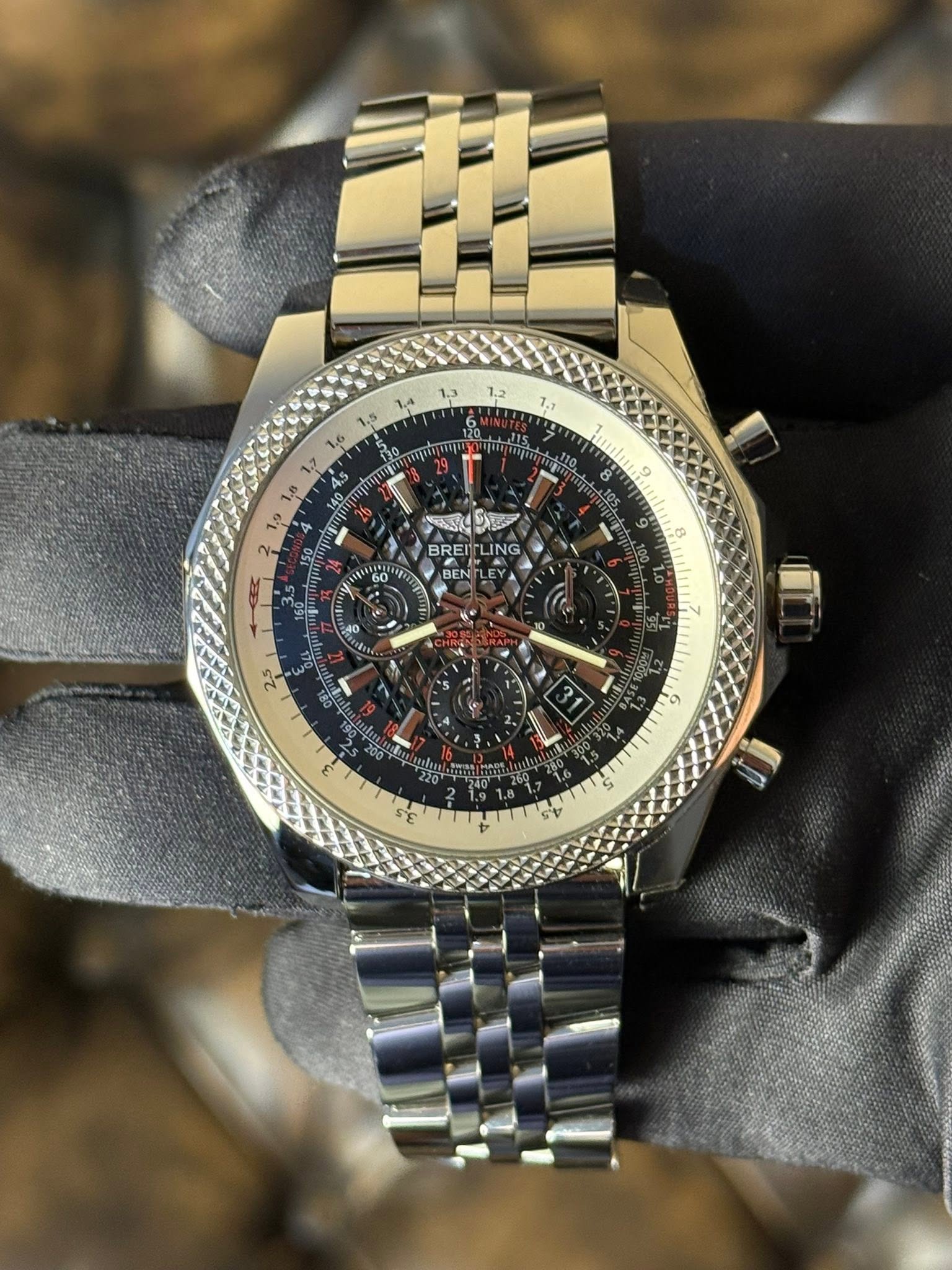 May be an image of wrist watch and text