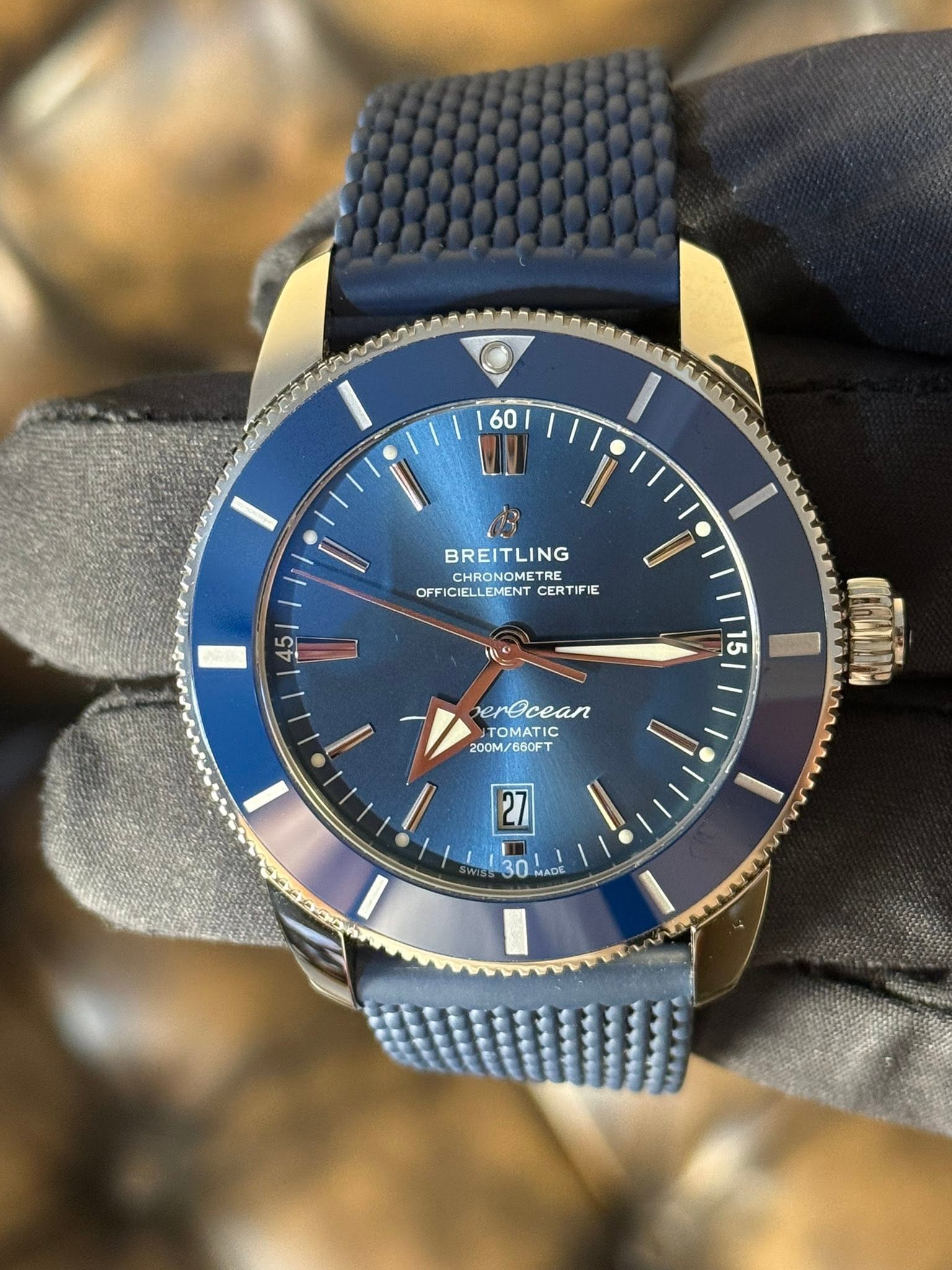 May be an image of wrist watch and text that says '60| 60 BREITLING CHRONOMETRE OFFICIELLEMENT CERTIFIE OFFICIELLEMENTCERTIFIE E I 45 15 erOcean TOMATIC C 200M/660FT /660FT 200M/…