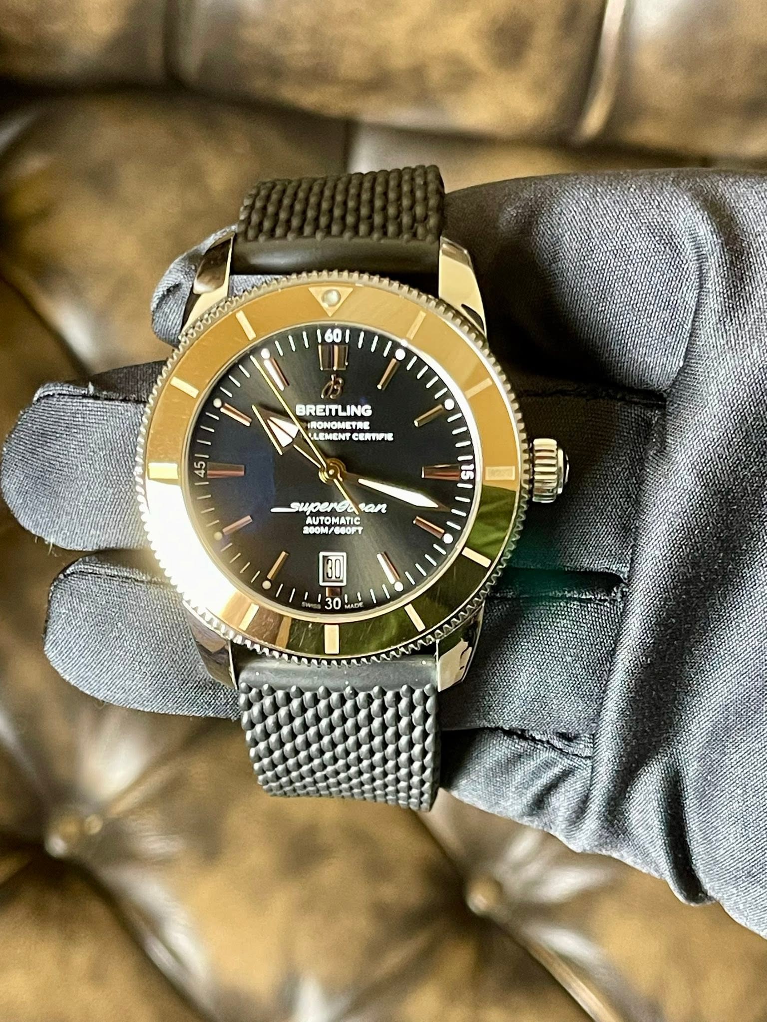 May be an image of wrist watch and text