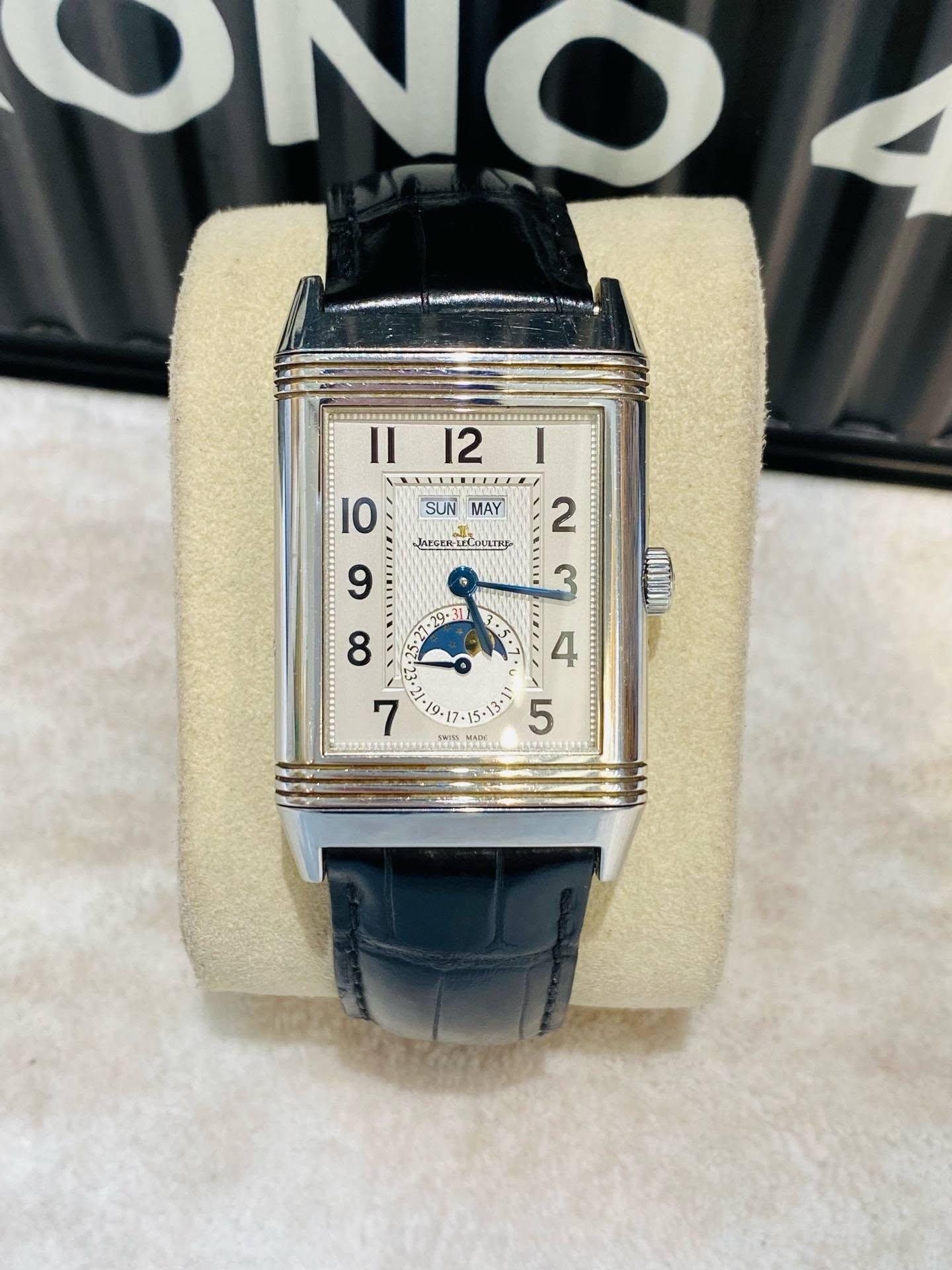 May be an image of wrist watch and text