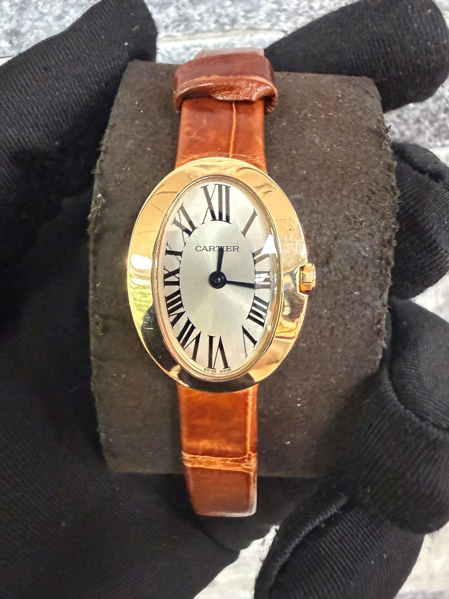 May be an image of wrist watch, leather and text that says 'MLAII XI XII IXK Y CARTER CART ER IX IN VIIVII VIII VIII ラ IIII IIII MIIIXI'