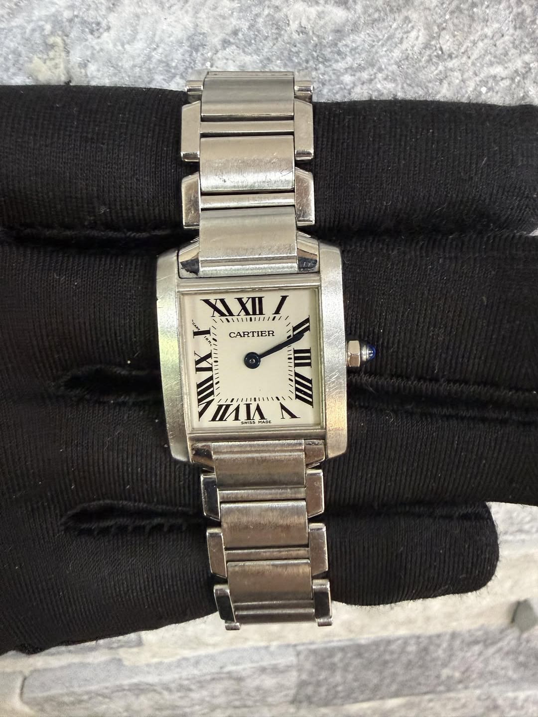 May be an image of digital watch and text