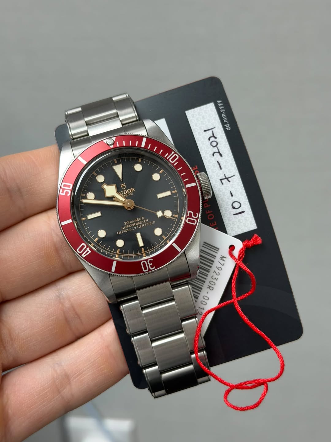 May be an image of wrist watch and text