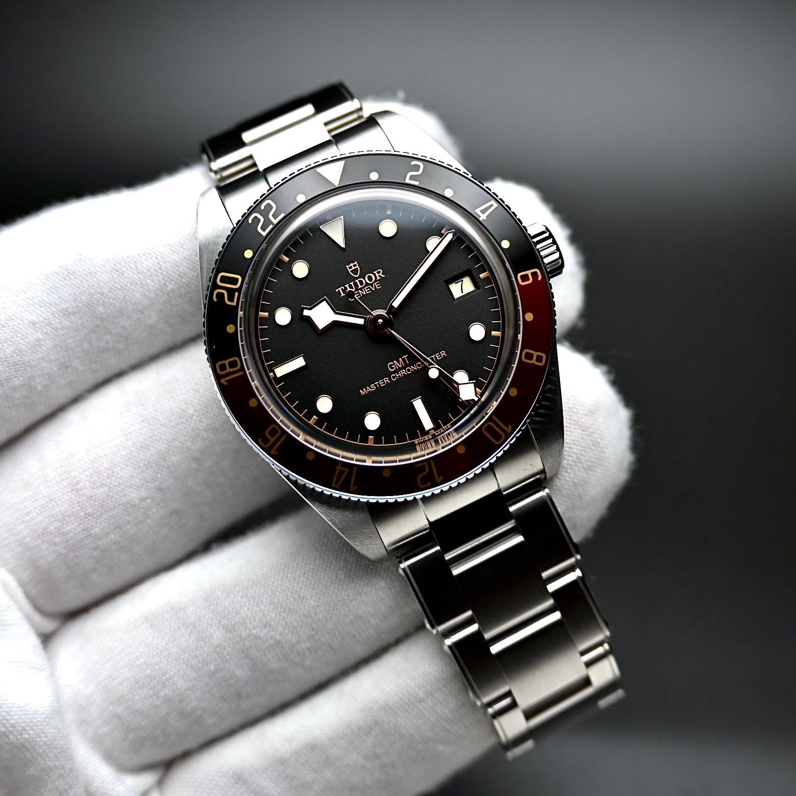 May be an image of wrist watch and text