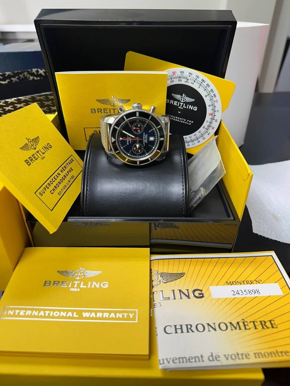 May be an image of wrist watch and text that says 'BREIT ন משול Bor REITLING RUMENTEFOR FESSIONALS ESSIGNALE UMENTSFO SE 営馬. 4 2 茶 BREITLING HÉRITAGE PHE SUPEROCEAN EDITION…