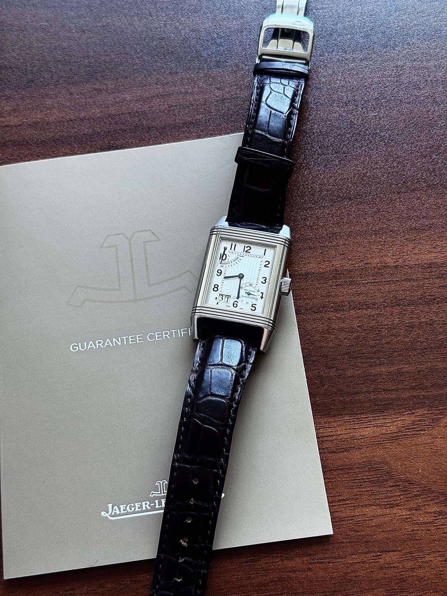 May be an image of wrist watch and text that says 'ሞች : 37 S 10 5 GUARANTEE CERTIFI D ΣΑΝΗ ال JAEGER-LP'