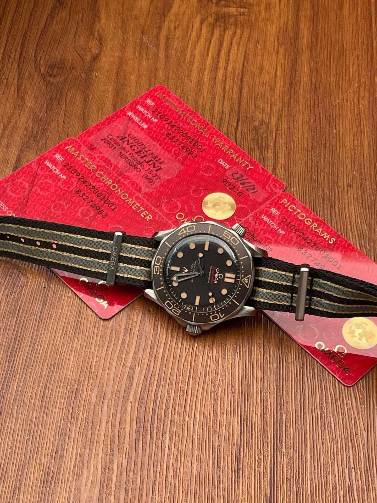 May be an image of wrist watch and text that says 'JEWELLER WATOHN® หุ 20831SEREGNO וששסמ 83204 REF WATOHN® MASTERCHRONOMETER 20831SRCN37 71083 WARRANTY DATE HRONOMETER /6/21…
