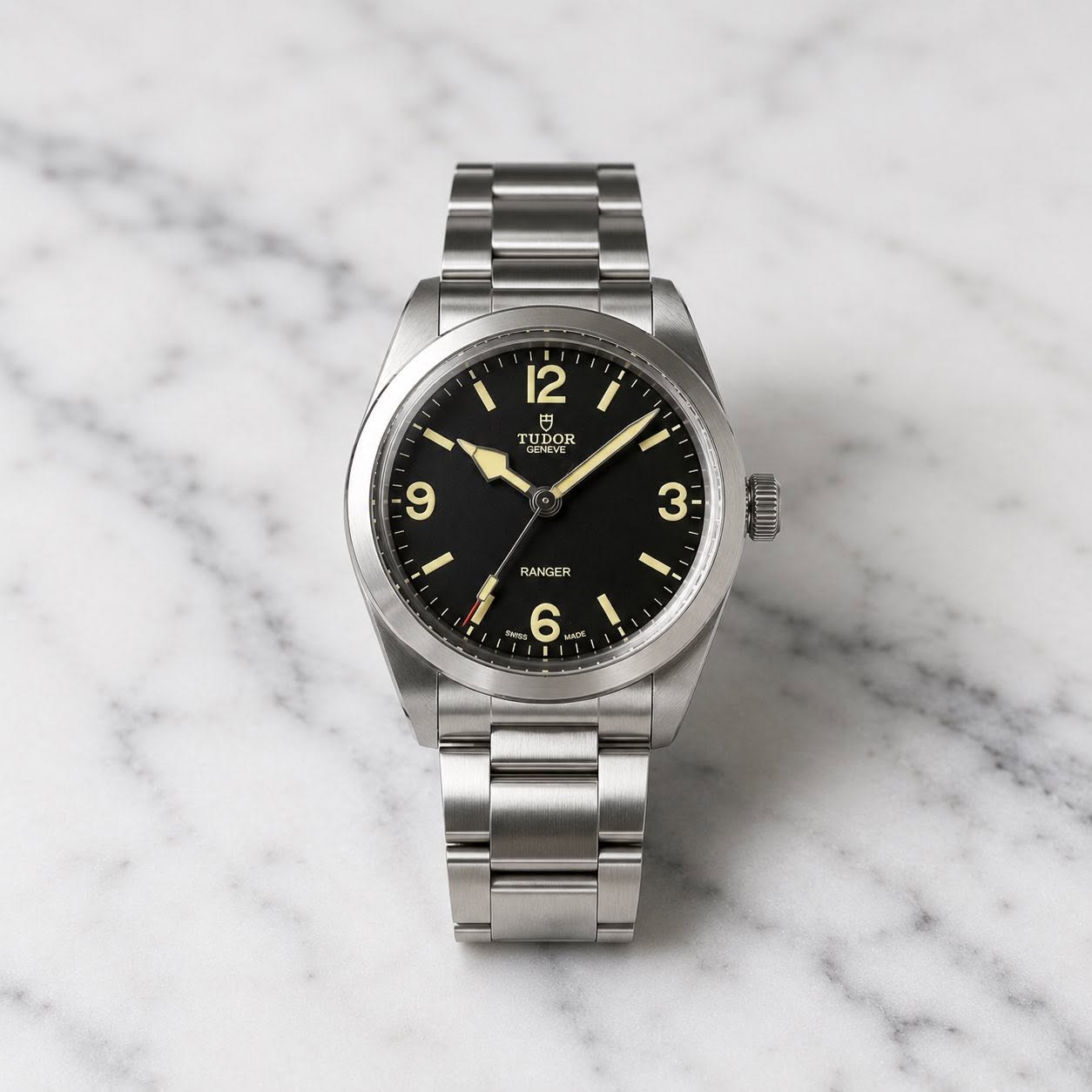 May be an image of wrist watch and text that says '12 د TUDOR HEVE OR UR UDOR AD 9 I 3 RANGER MI 6'