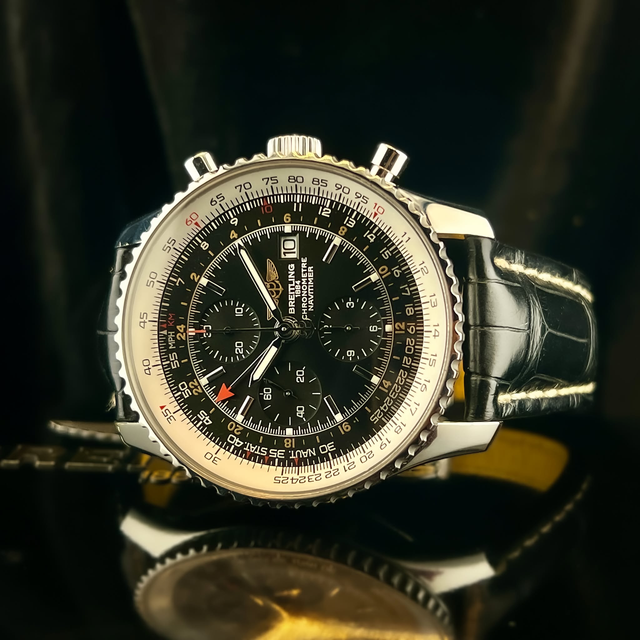 May be an image of wrist watch and text