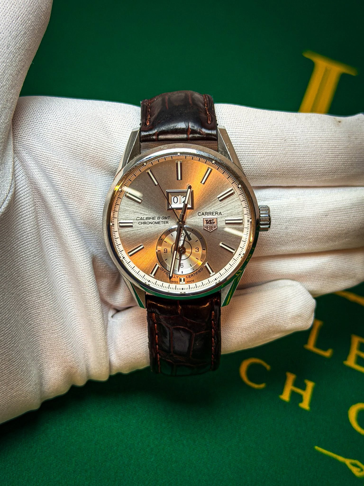 May be an image of wrist watch and text