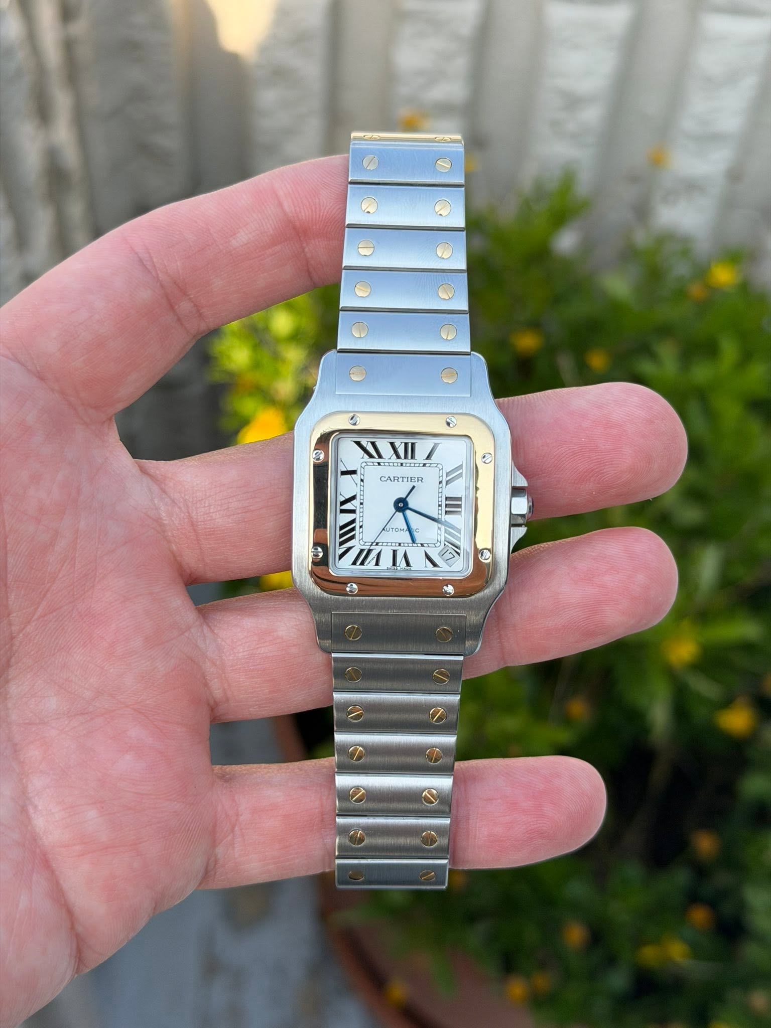 May be an image of digital watch and text