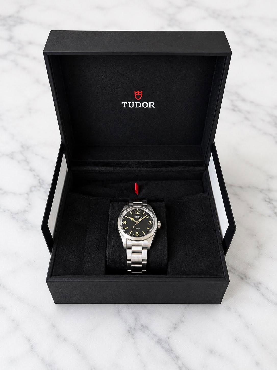 May be an image of wrist watch and text