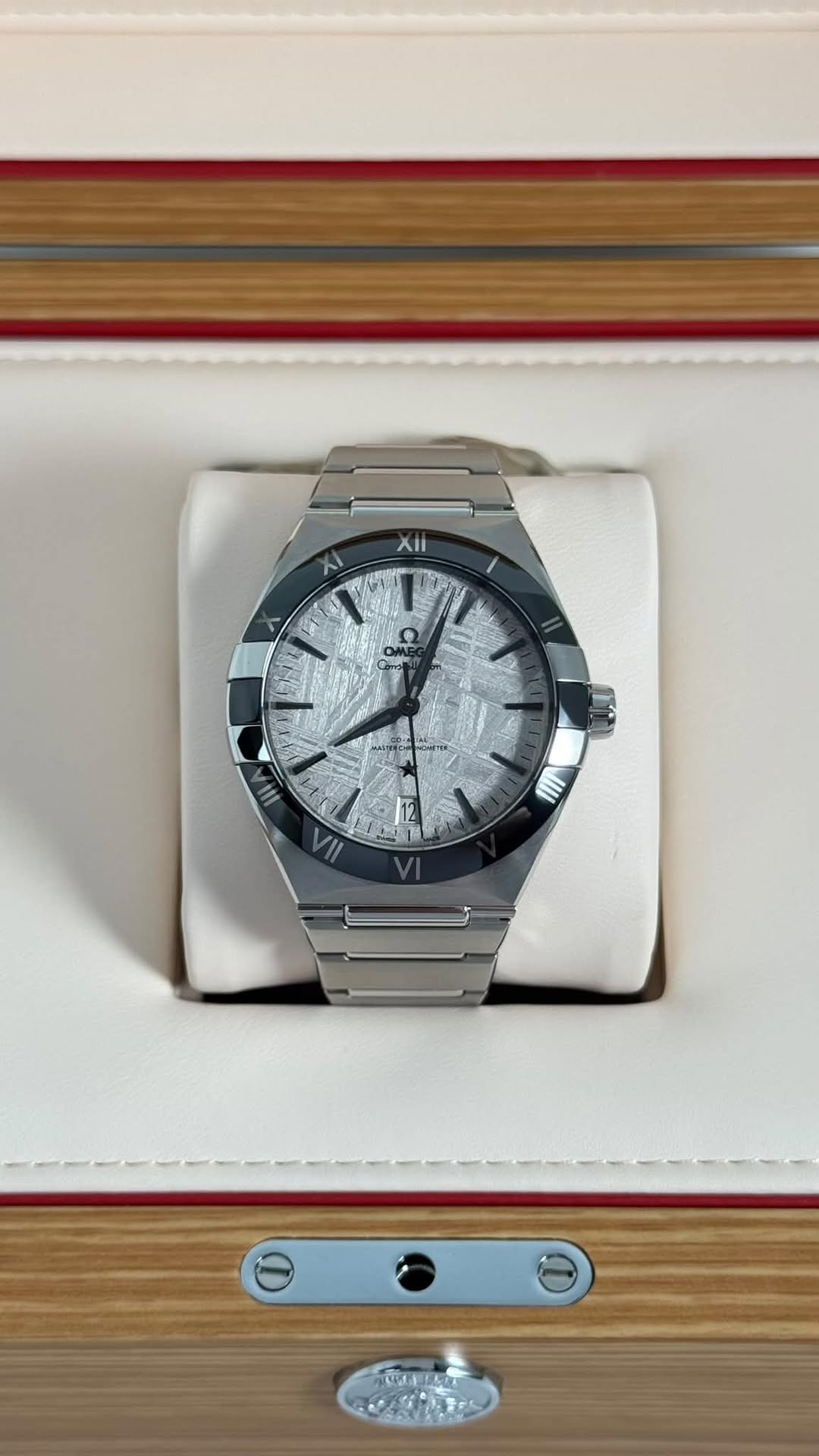 May be an image of wrist watch and text