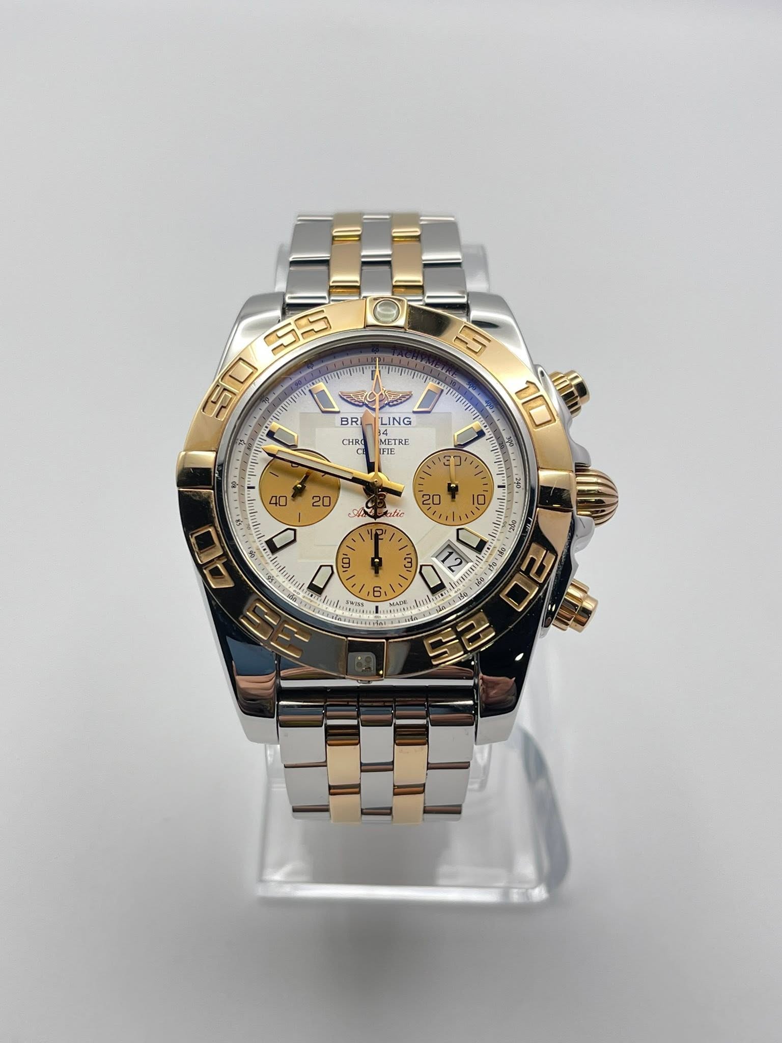 May be an image of wrist watch and text