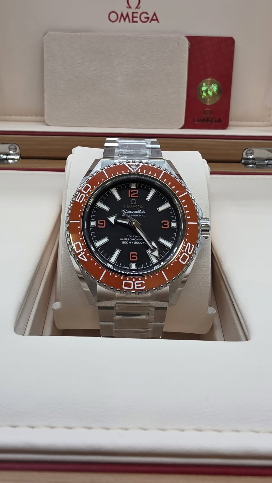 May be an image of wrist watch and text